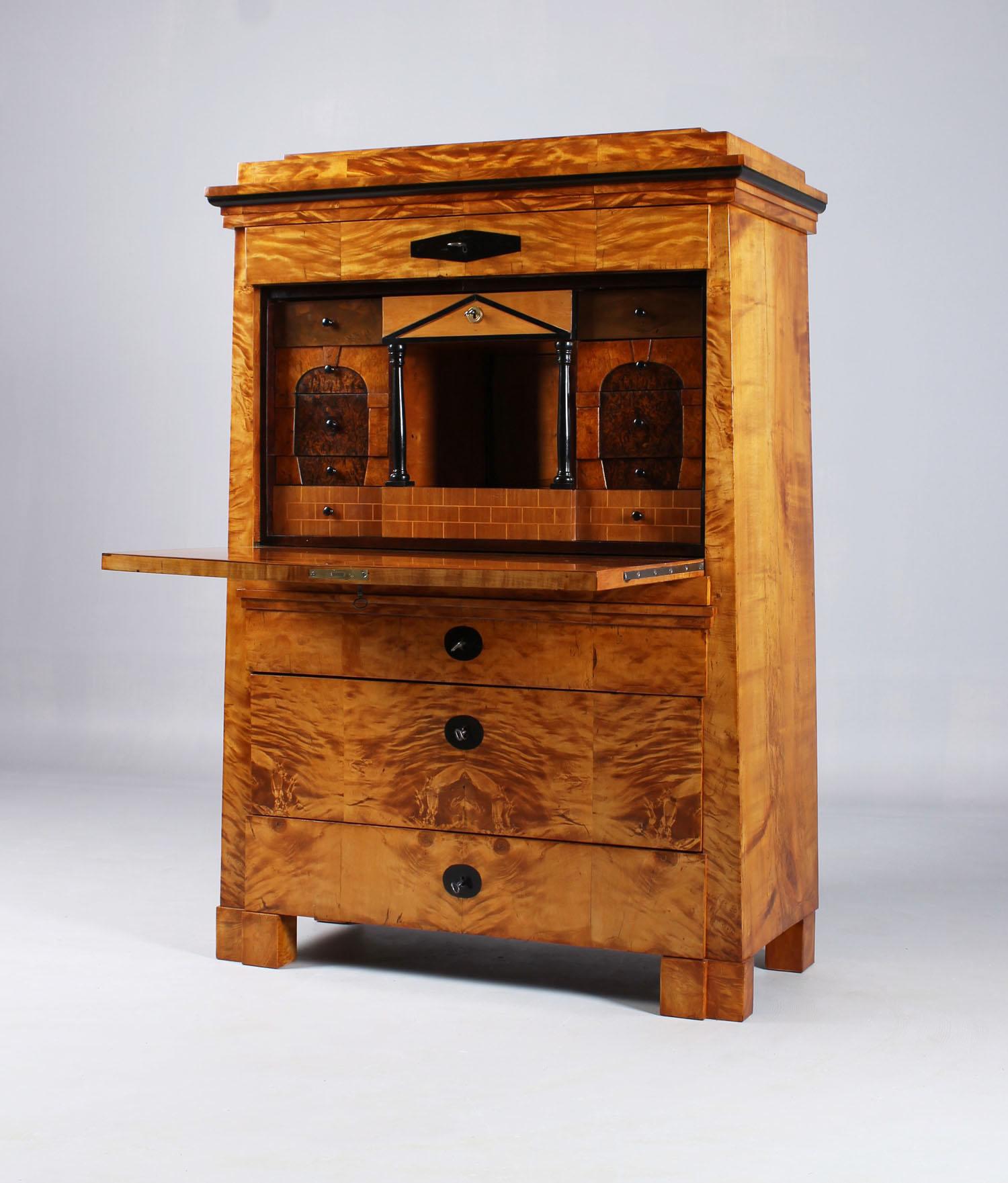 Conical secretary

North-East Germany
birch,
19th century, Biedermeier, circa 1820

Dimensions: H x W x D 150 x 102 (94) x 52 cm

Description:
Rare conically tapering secretary with strongly flamed birch veneer.

The lowest drawer is