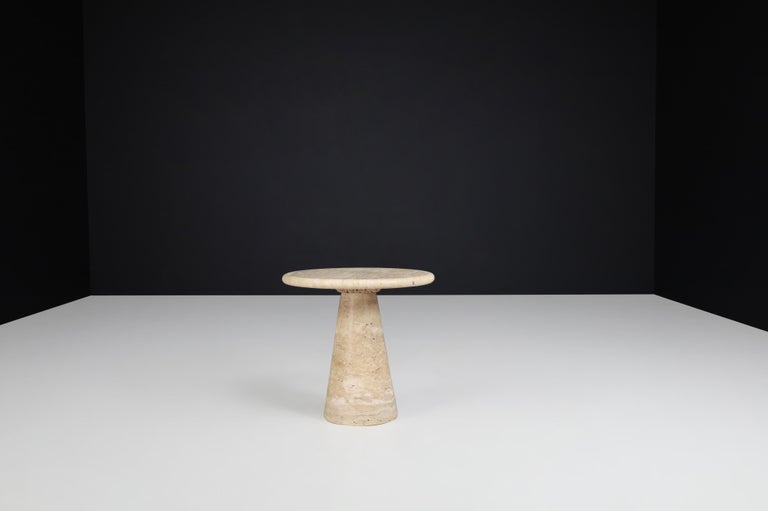 Conical travertine side tables, Italy, the 1980s

Modern circular travertine side tables or coffee tables, Italy 1980s. Mid-Century Modern circular side tables style of Angelo Mangiarotti in travertine with a conical-shaped base. The form is