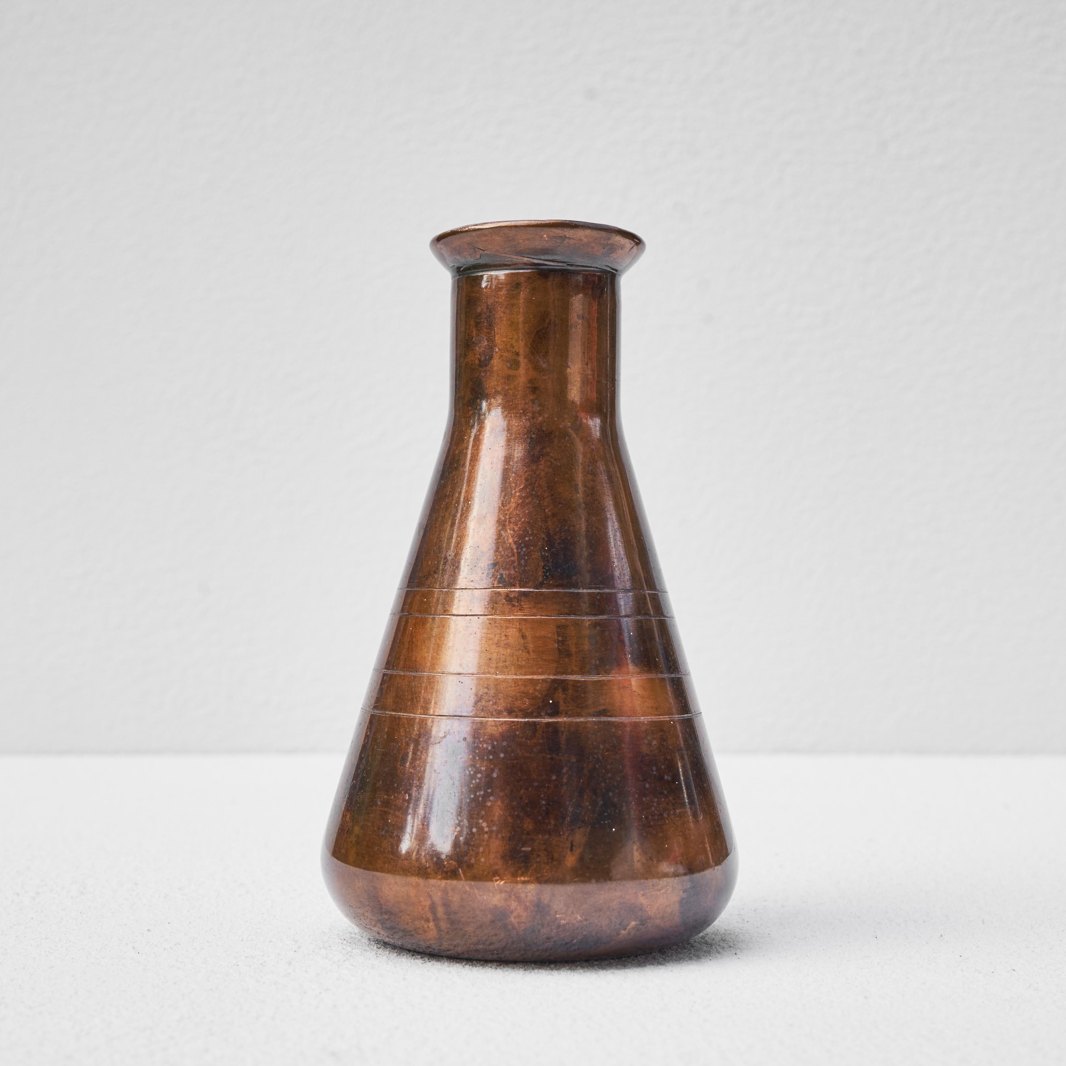 Conical Vase in Patinated Copper, 1950.

Wonderful vase in patinated copper, made by a craftsman in 1950. Dated on the underside. 

Great as a decorative item or as a vase - soliflore or with a small arrangement of flowers. Wonderful patination