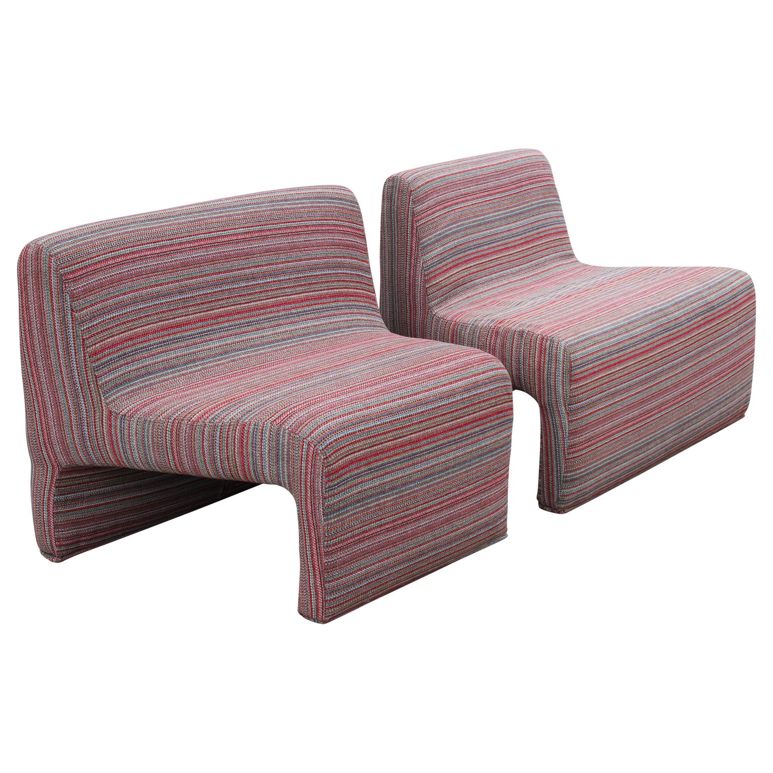 Delightful mismatched conjoining modular lounge chairs that are sculptural and modern in design. Fun, seventies feel that will add a pop of color into any room for an aesthetically pleasing look.