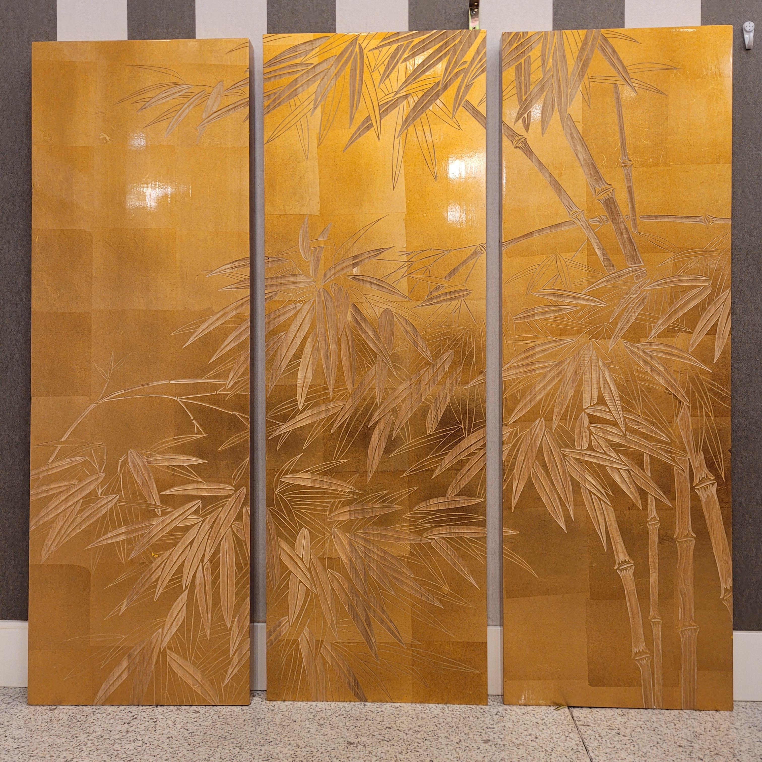 Very refined and beautiful set of three hand-carved and gilded wood panels, masterfully depicting the bamboo plant, made in China in the 1980s. The highlight of this piece is not its delicate oriental aesthetic, but the exceptional nature of its