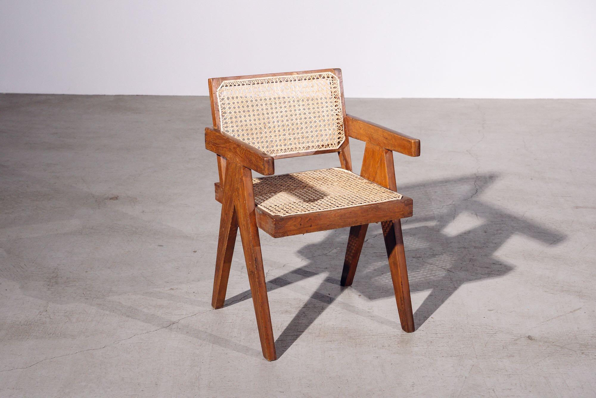 An authentic mid-century piece from Pierre Jeanneret’s legendary Chandigarh commission. Teak frame with hand-woven bamboo-rattan seat & back.

Letter : LIB. B.YO2. (Unidentified Library Chandigarh)