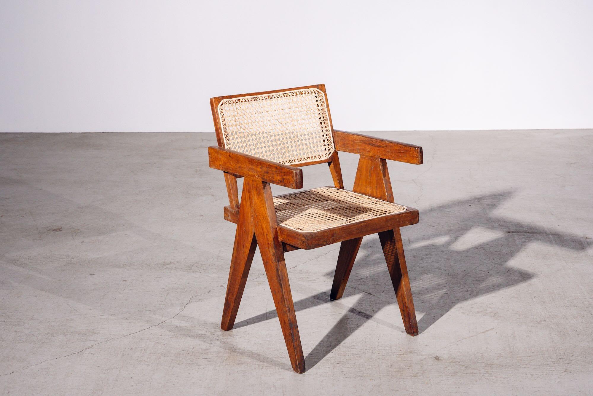 An authentic mid-century piece from Pierre Jeanneret’s legendary Chandigarh commission. Teak frame with hand-woven bamboo-rattan seat & back.