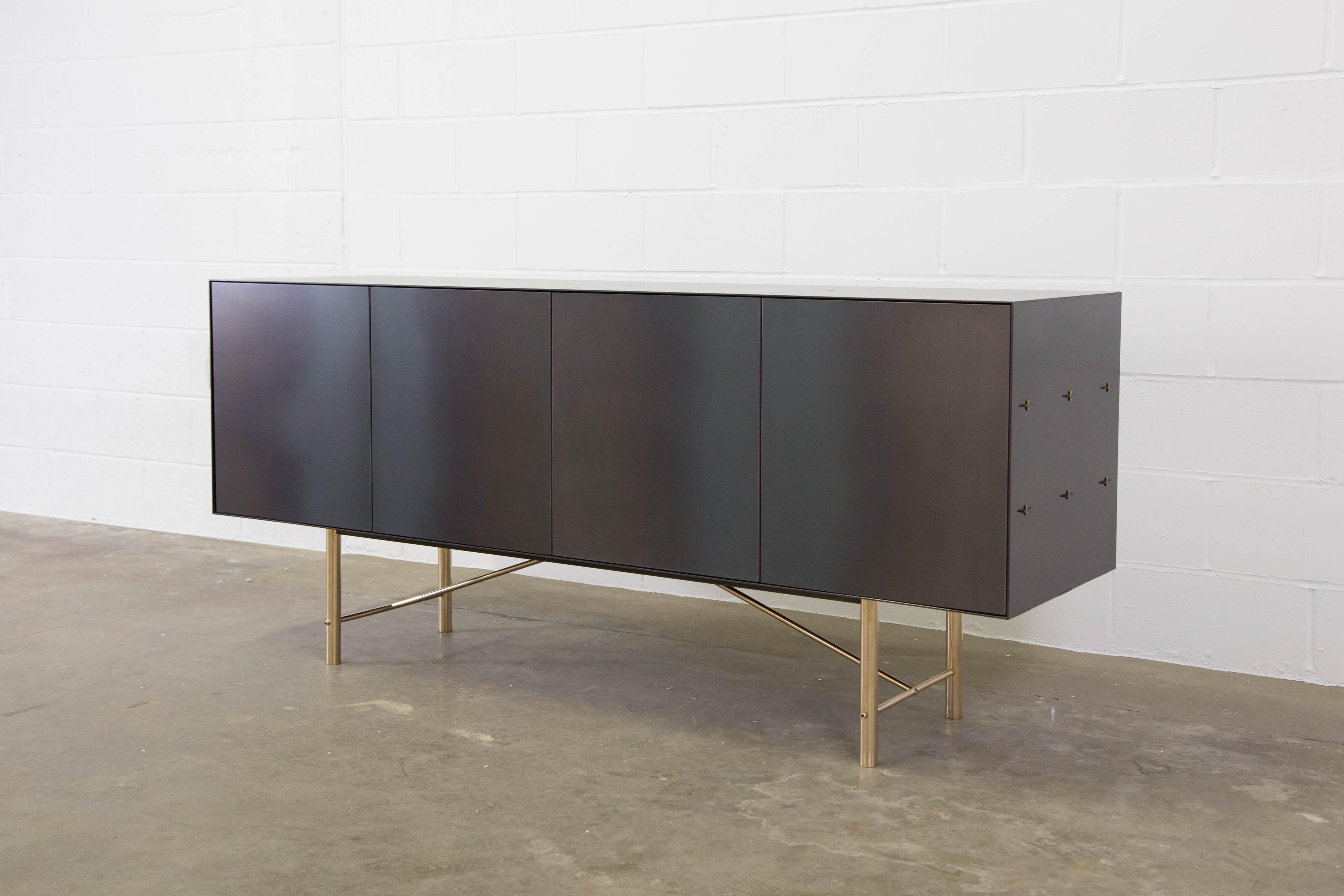 The Connect credenza is emblematic of the contemporary interweaving of mass manufacturing and traditional joinery technique.

Construction and fastening details remain as evidence of process and are integral to the final piece. Mechanical