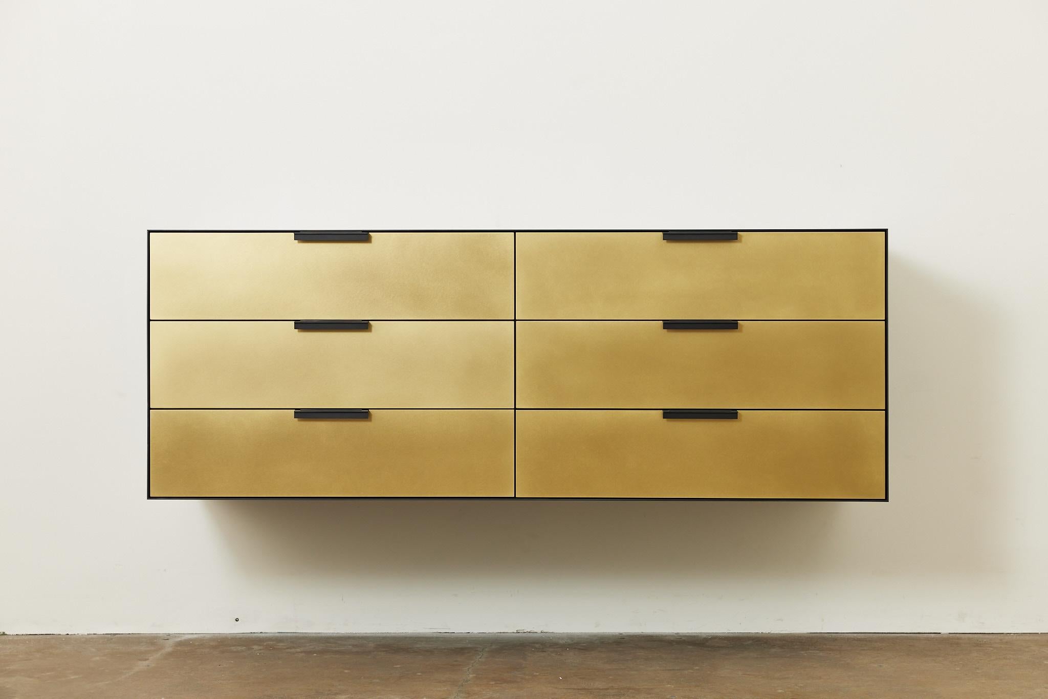 The Connect Floating Dresser is designed to express the process by which each piece is created, with visible construction and fastening details that are integral to the final piece. 

Traditional joinery techniques are used in conjunction with mass