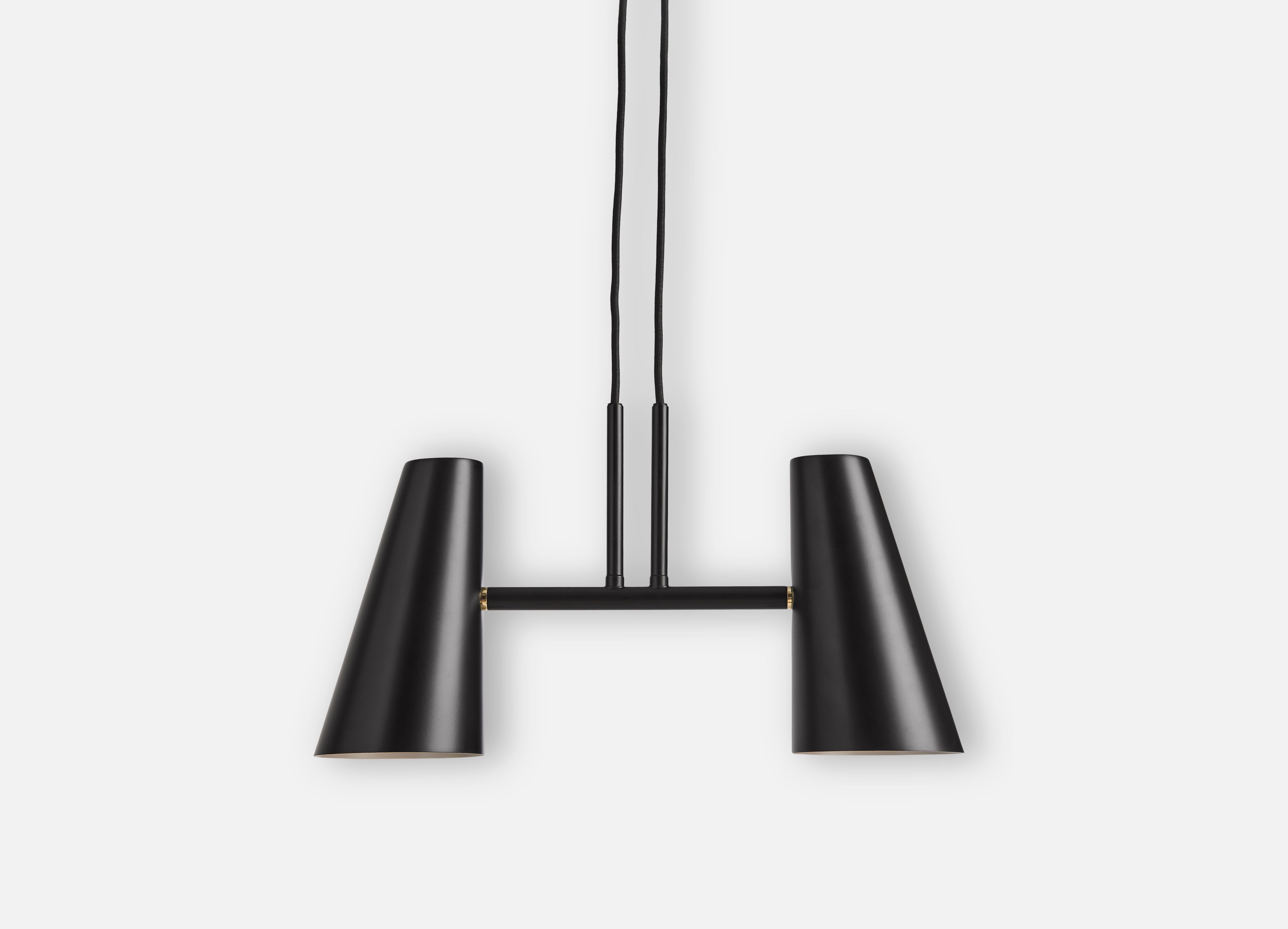 Cono 2 shades pendant lamp by Benny Frandsen.
Materials: Metal.
Dimensions: D 11 x W 42 x H 19.7 cm.

Benny Frandsen is a renowned and experienced danish designer and founder of the lighting company frandsen, which has designed, manufactured and