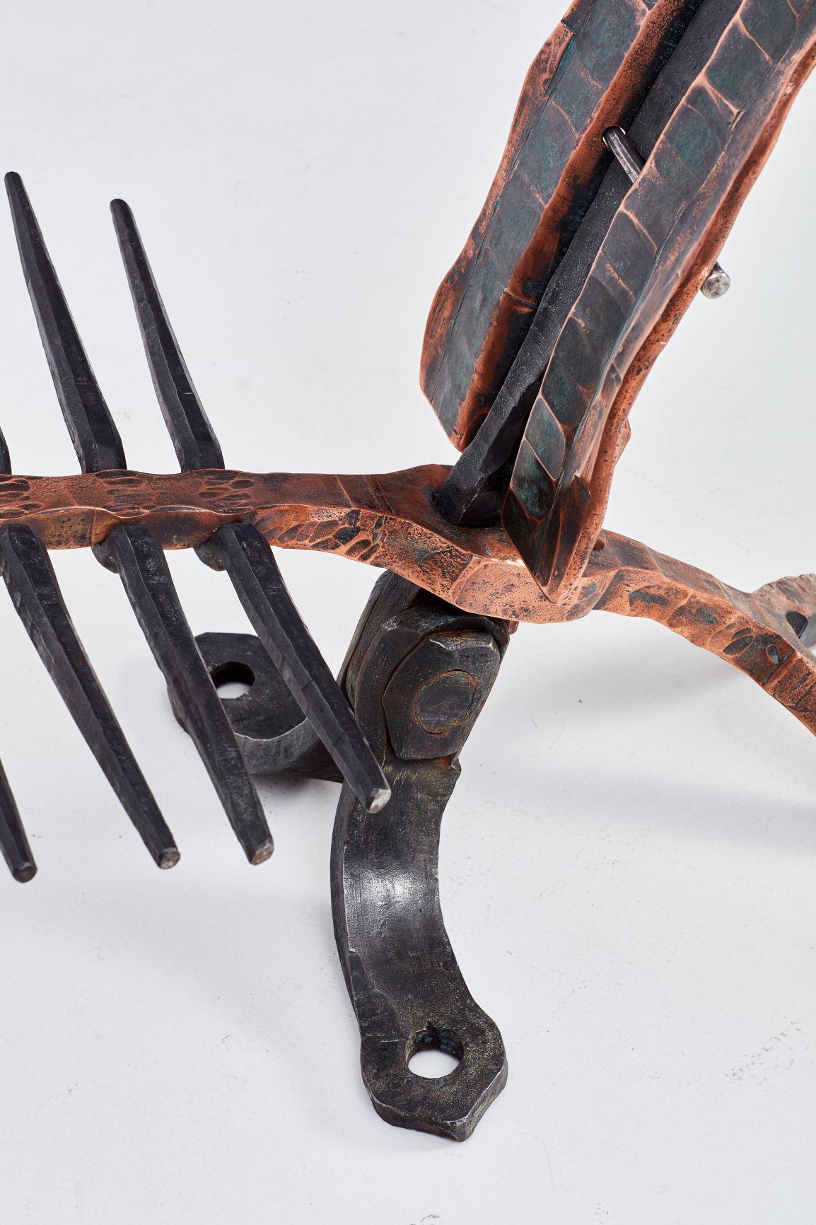 Conrad Hicks is an artist, blacksmith and tool-maker in Cape Town. He specialises in hand forged metal work, using only traditional blacksmithing jointing methods as he believes these are essential to the symbolic meaning of the finished form. He