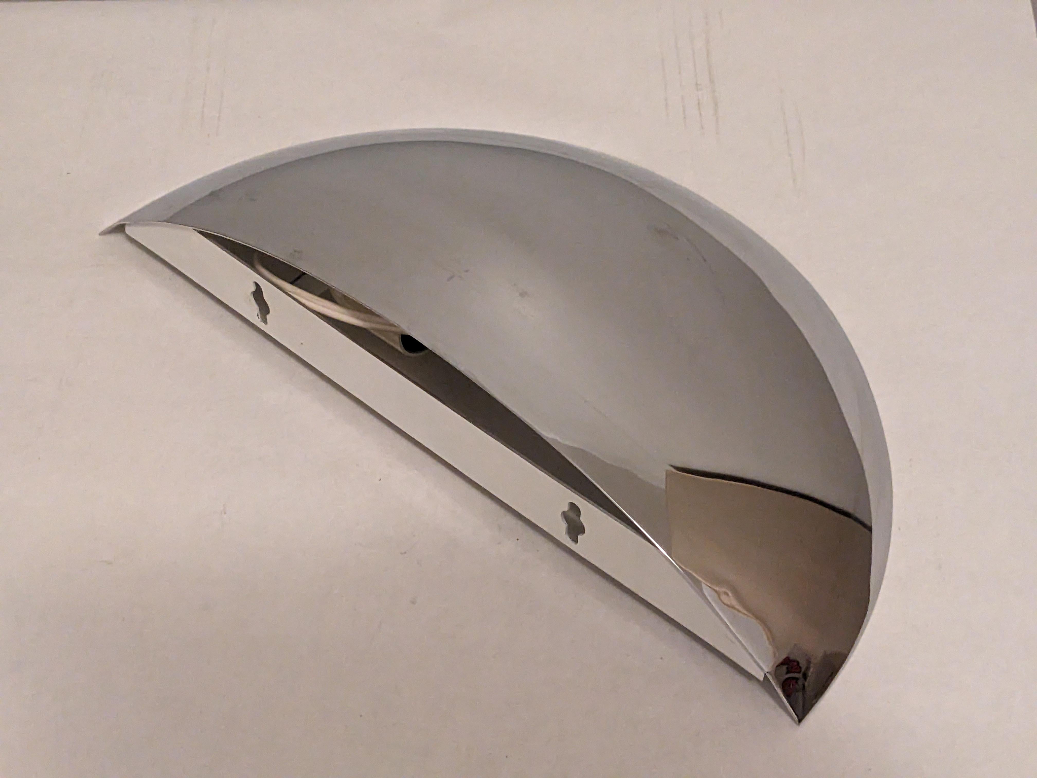Chrome Half Moon Up Light Elliptical Sconce retailed by Conran's in the 1980's in original box. Made in France. 15.5