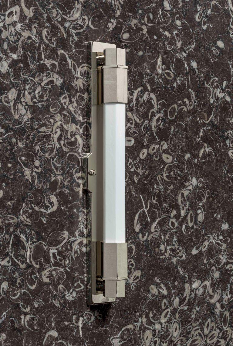 The Conroy is a heavy brass fixture with a handcrafted central opaline glass shade that is of staggering quality. Finished in nickel. The Light is suited to many varied locations but is IP44 rated for bathroom or damp use as standard. Please note