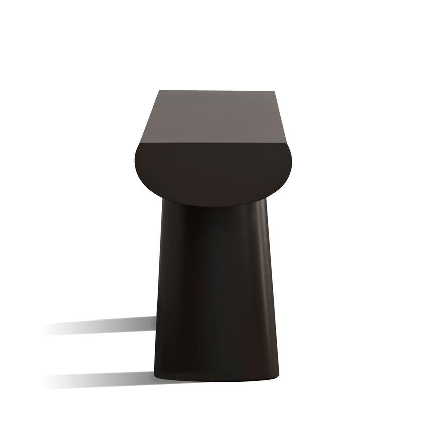 Consol Table by Aldo Bakker 

Tranquil and seductive, Aldo Bakker's Console floats exquisitely between sculpture and furniture. It depicts the simplest concept of a table: two columns and a surface. The legs are an elongation of the line created by