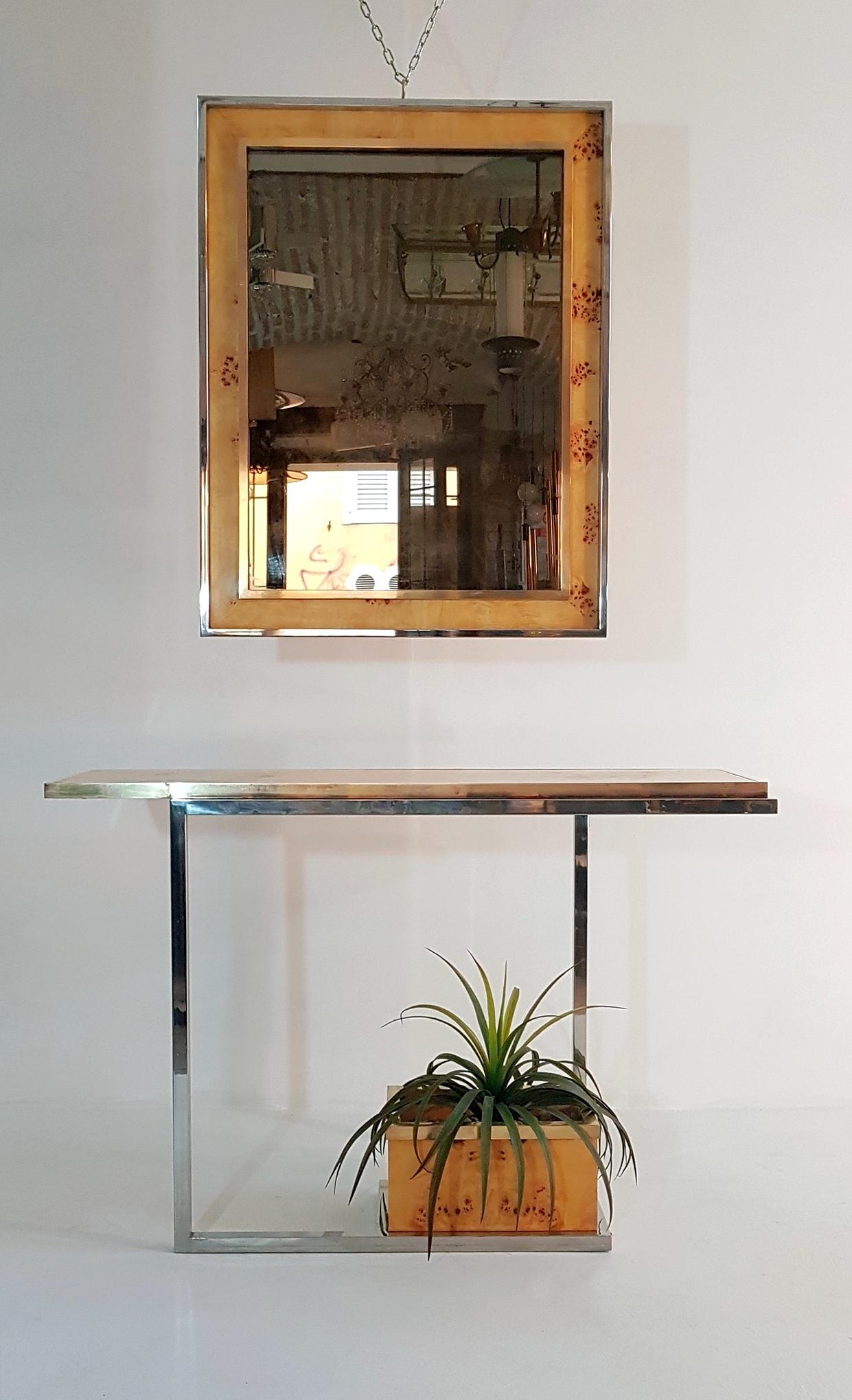 Console table with mirror in the manner of Willy Rizzo. This piece has a chrome base and brass details in combination with burl wood. There is also a flower pot included in this piece. Can be used with or without it. (plant not included in the