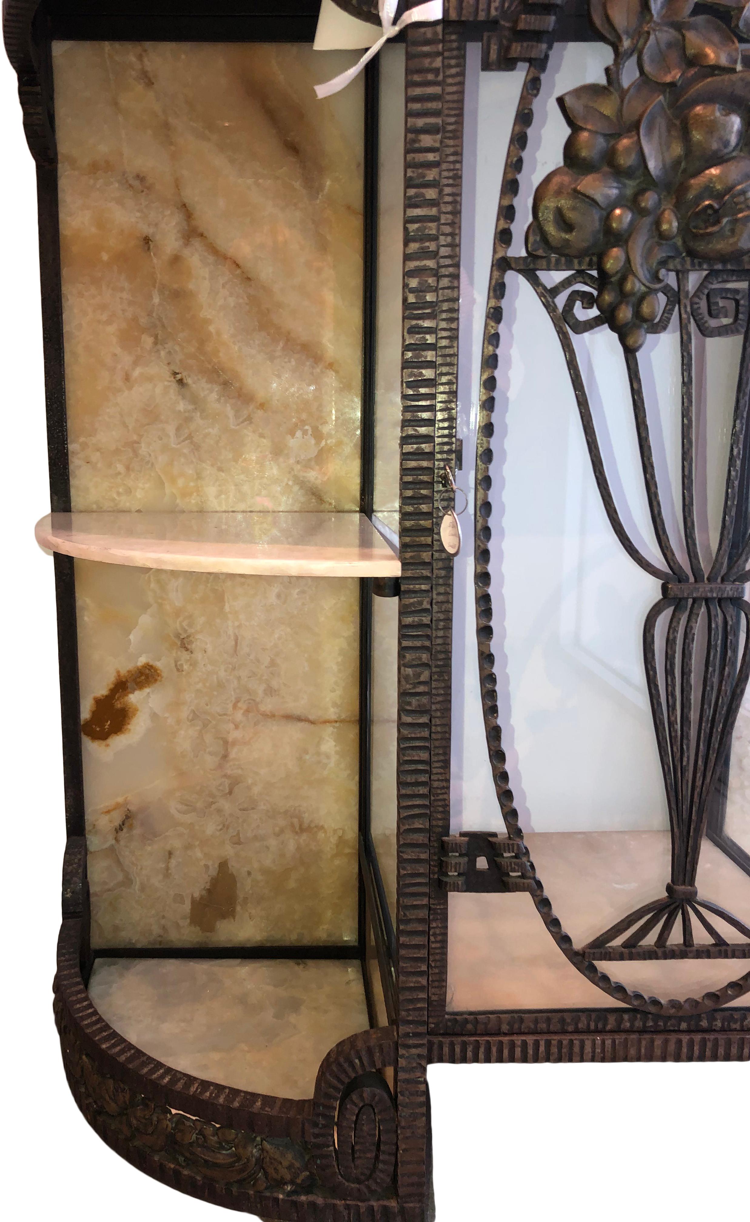 Console/side cabinet, wrought iron, bronze, onyx and glass by Raymond Subes.