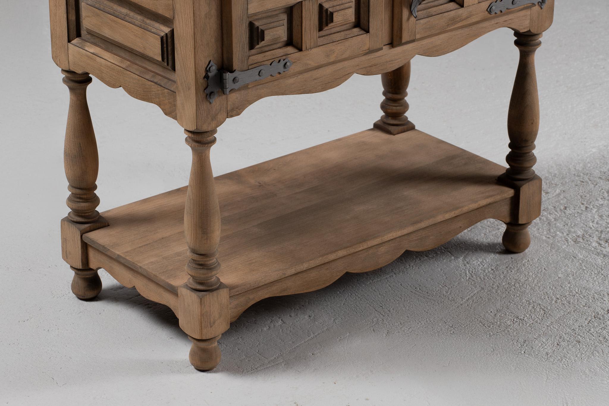 Hand-Carved Console Cabinet in Carved Elm with Turned Legs and Iron Latch, Spain, 1940s For Sale