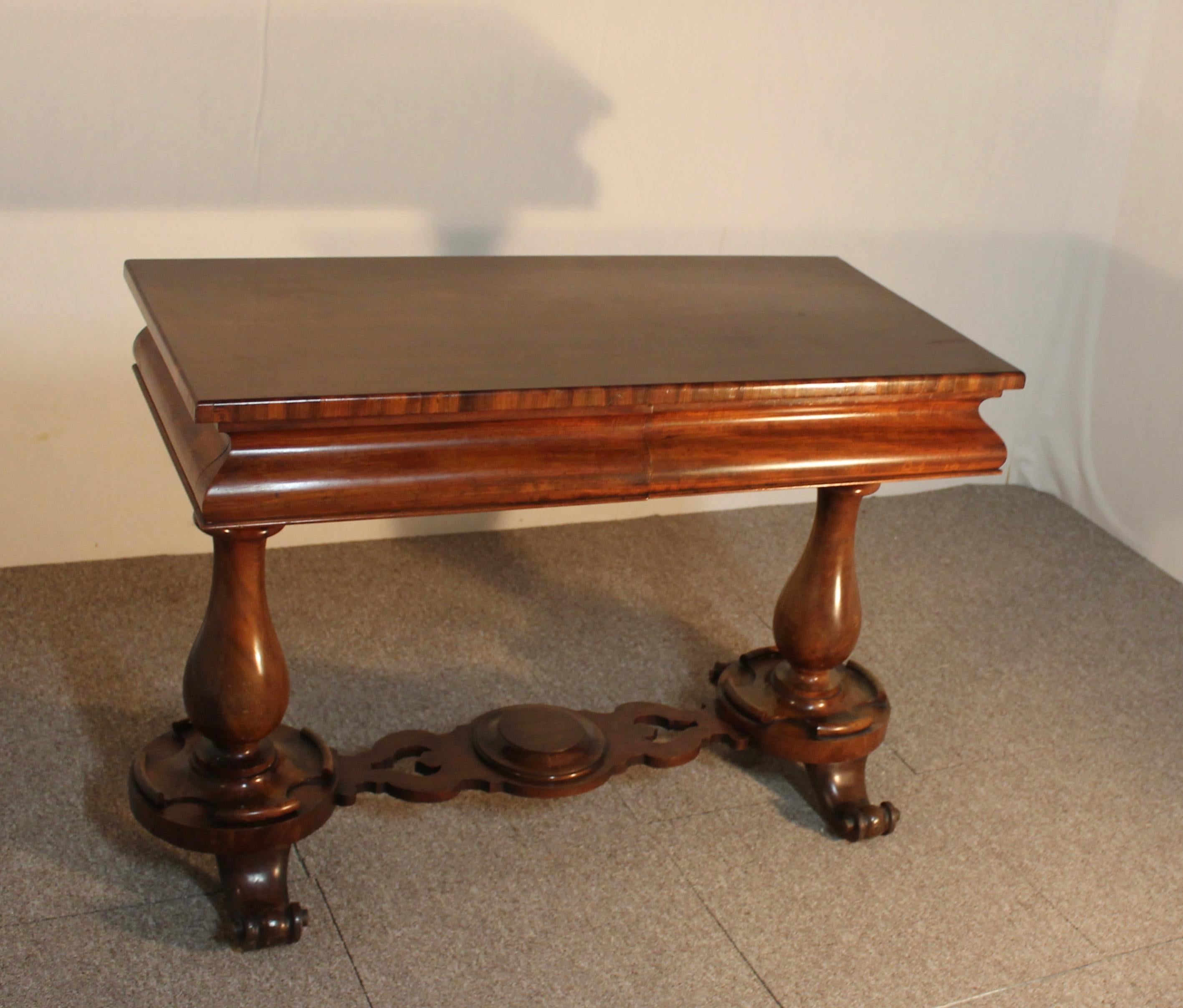 Console carved in English mahogany, XIX th, carved base, with two drawers in front.