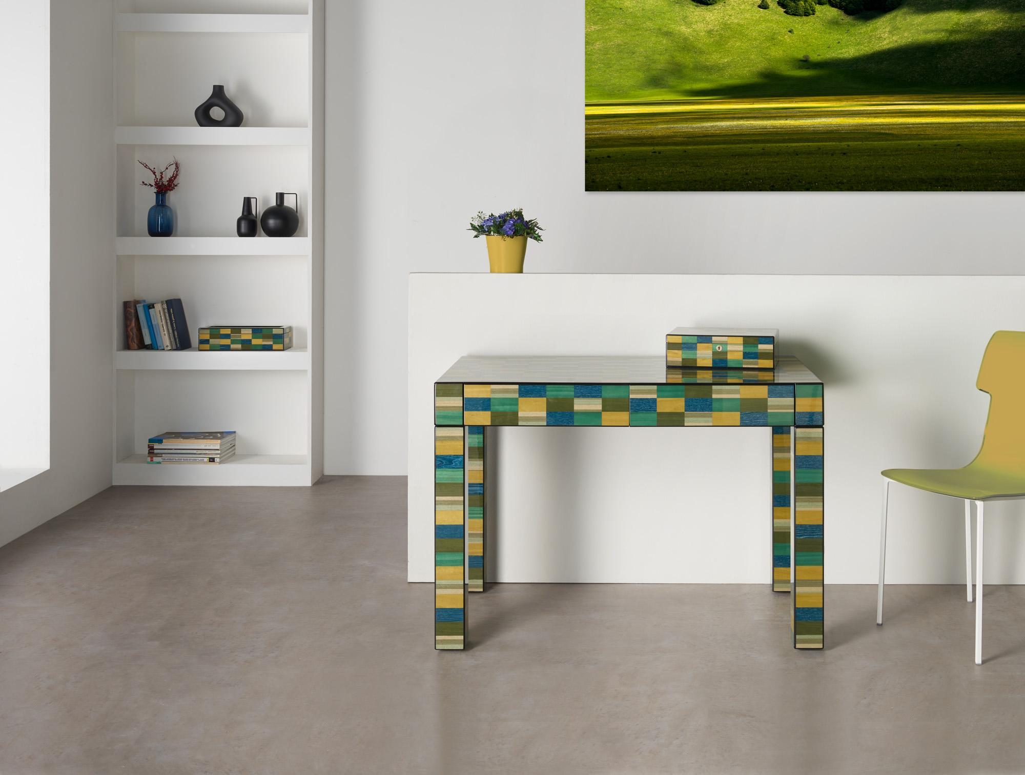 A tribute to modern and abstract art, this splendid console will be a bold and captivating statement in a contemporary or eclectic entryway. Entirely handcrafted of wood, it is veneered with splendid handmade inlay works, polished and brushed for an