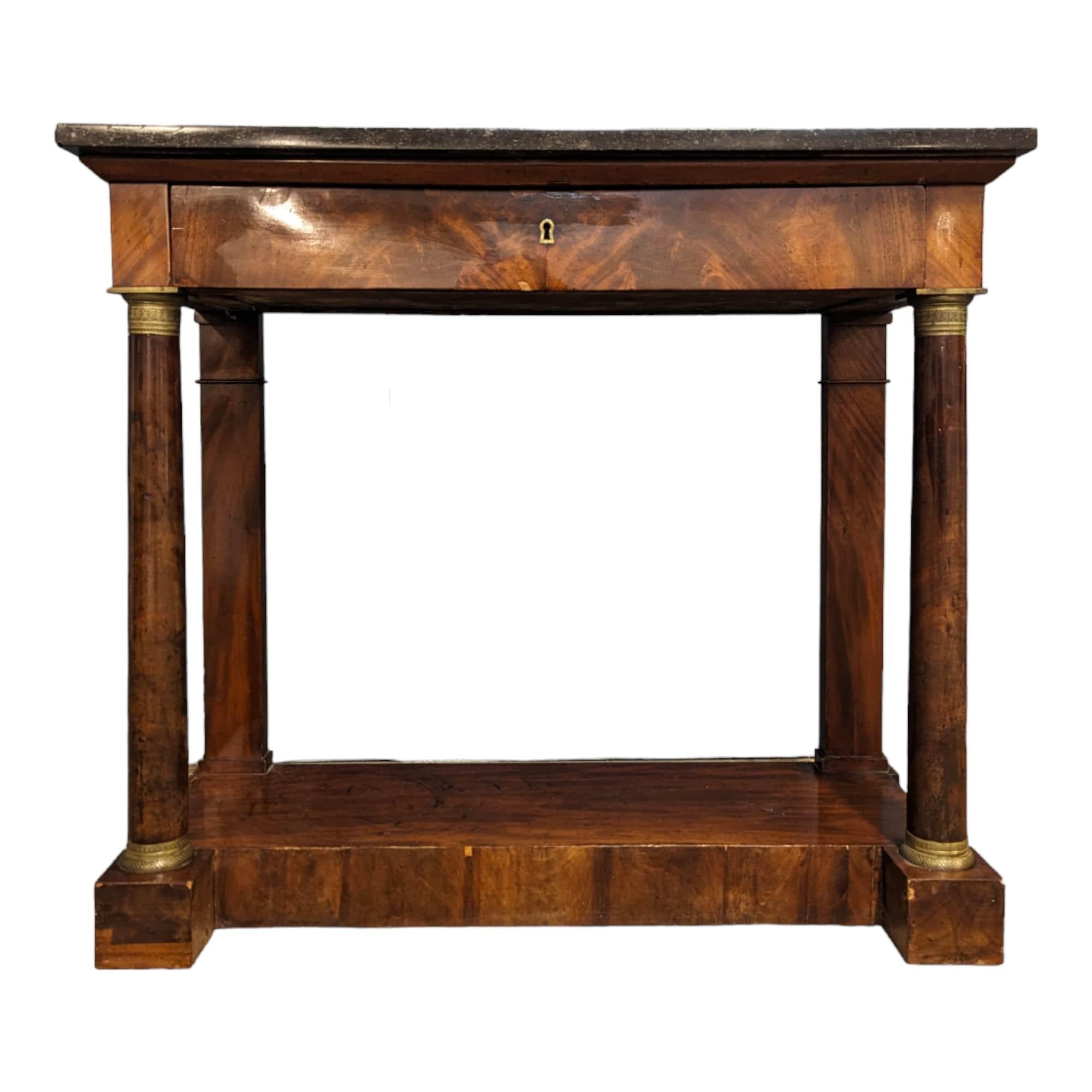 Coming from France. Add a touch of imperial grandeur to your home with this stunning Empire-style mahogany console table, a piece that evokes the opulence and majesty of the Napoleonic era.

Crafted from mahogany, a precious wood often associated