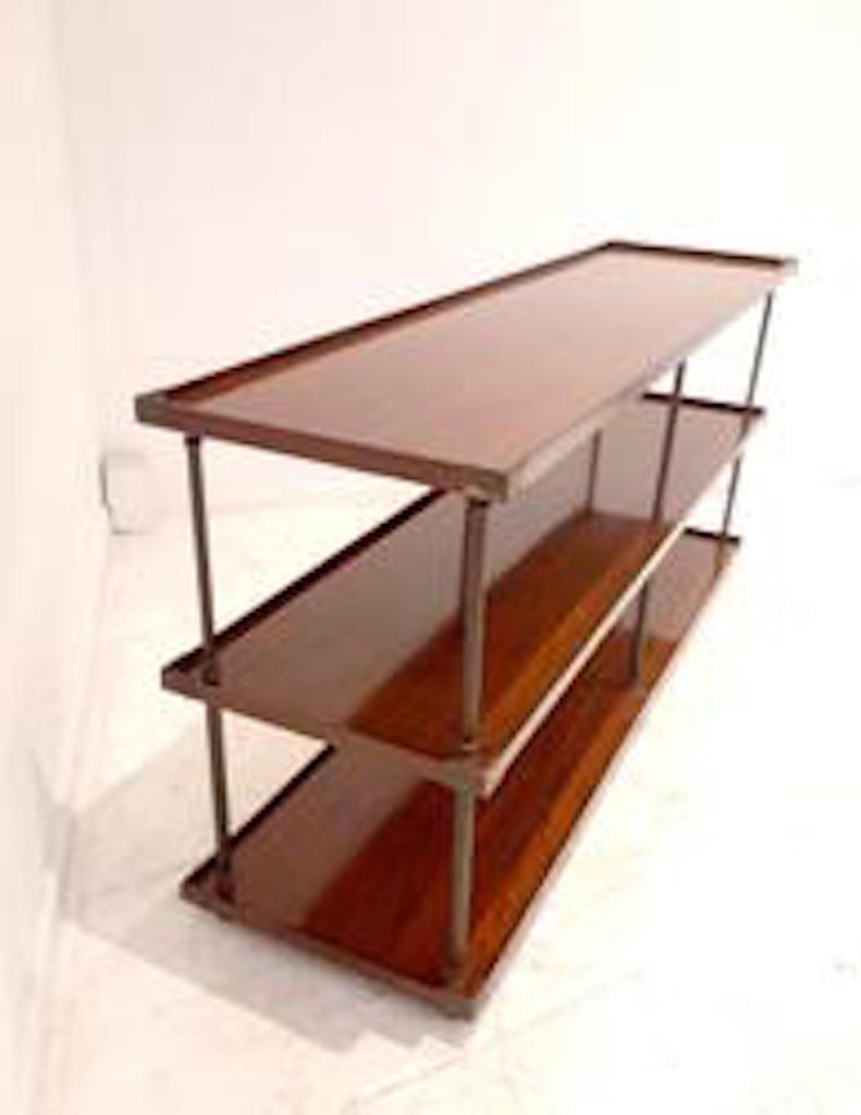 Mahogany and brass console by Pierre Lottier
