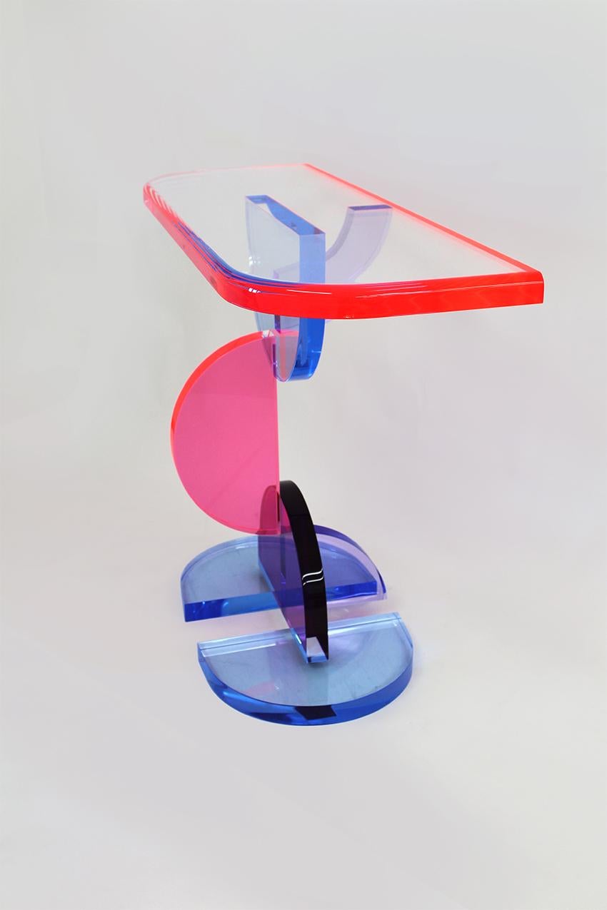Console Gonios designed by Marco Pettinari. 
The console is in plexiglass of different colors.

 