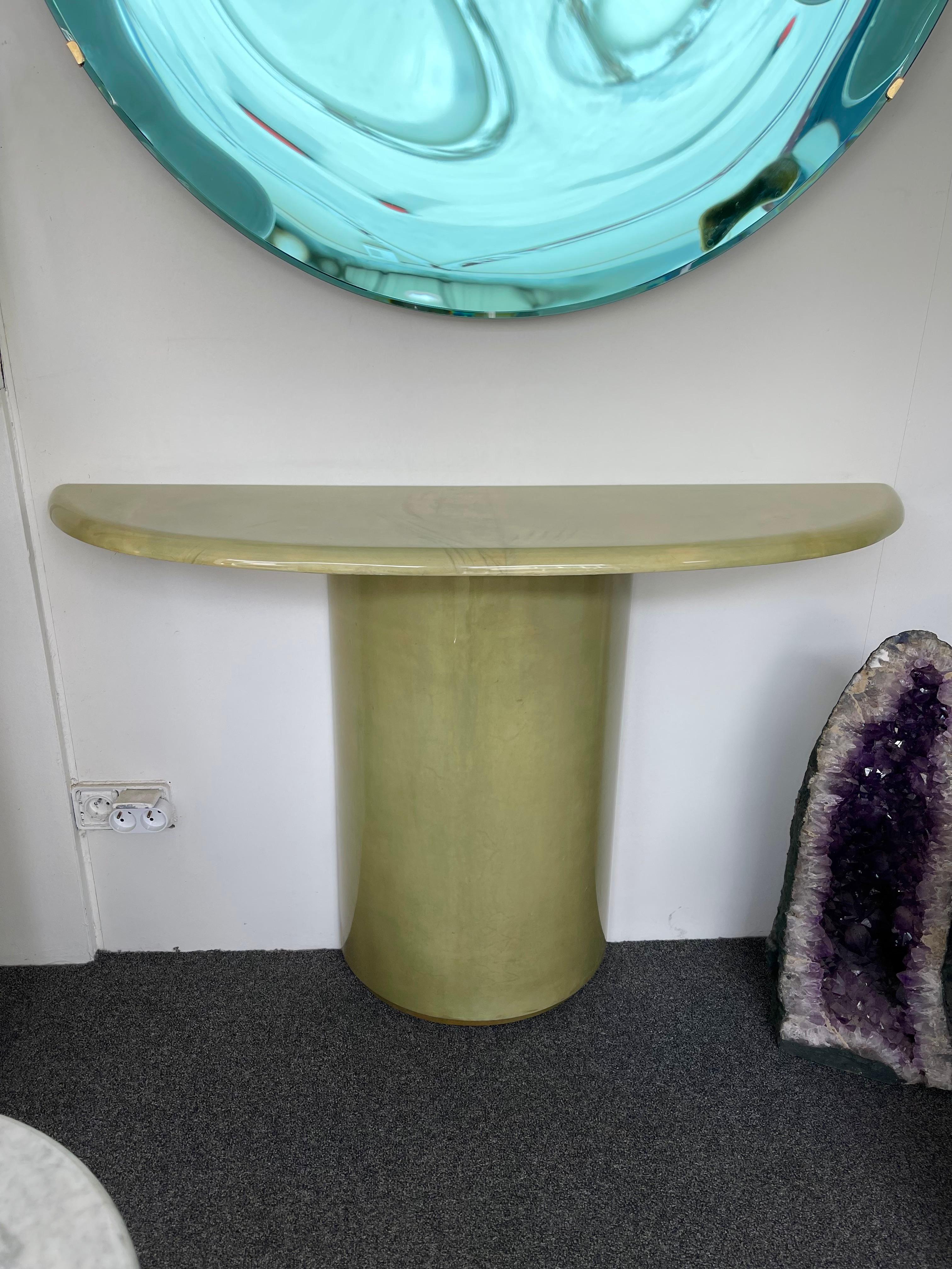 Console table half moon demi-lune in wood light green lacquered parchment goatskin by Aldo Tura.