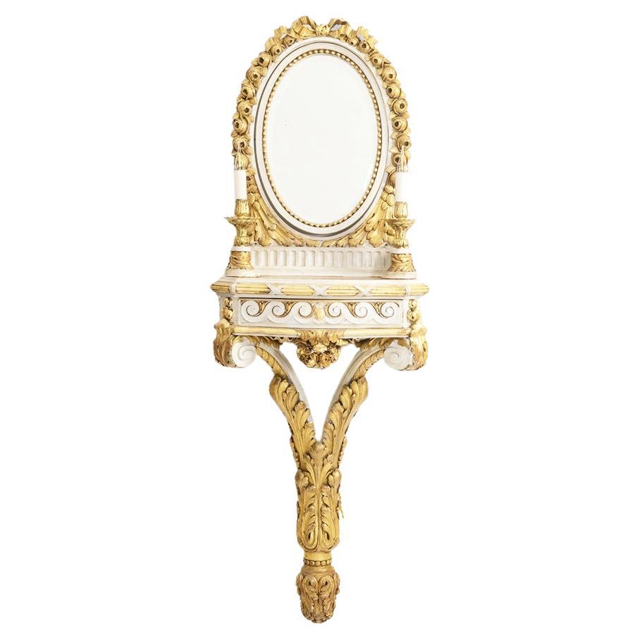 Consola de madera dorada y lacada de estilo Luis XVI. Alrededor de 1900.