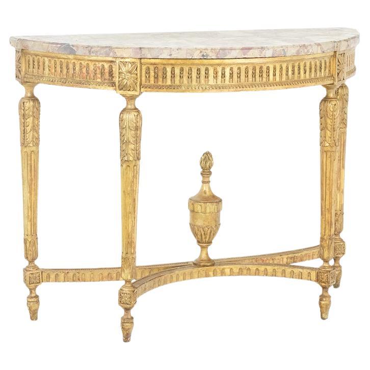Consola de madera dorada y mármol breccia de Alepo. Alrededor de 1780.