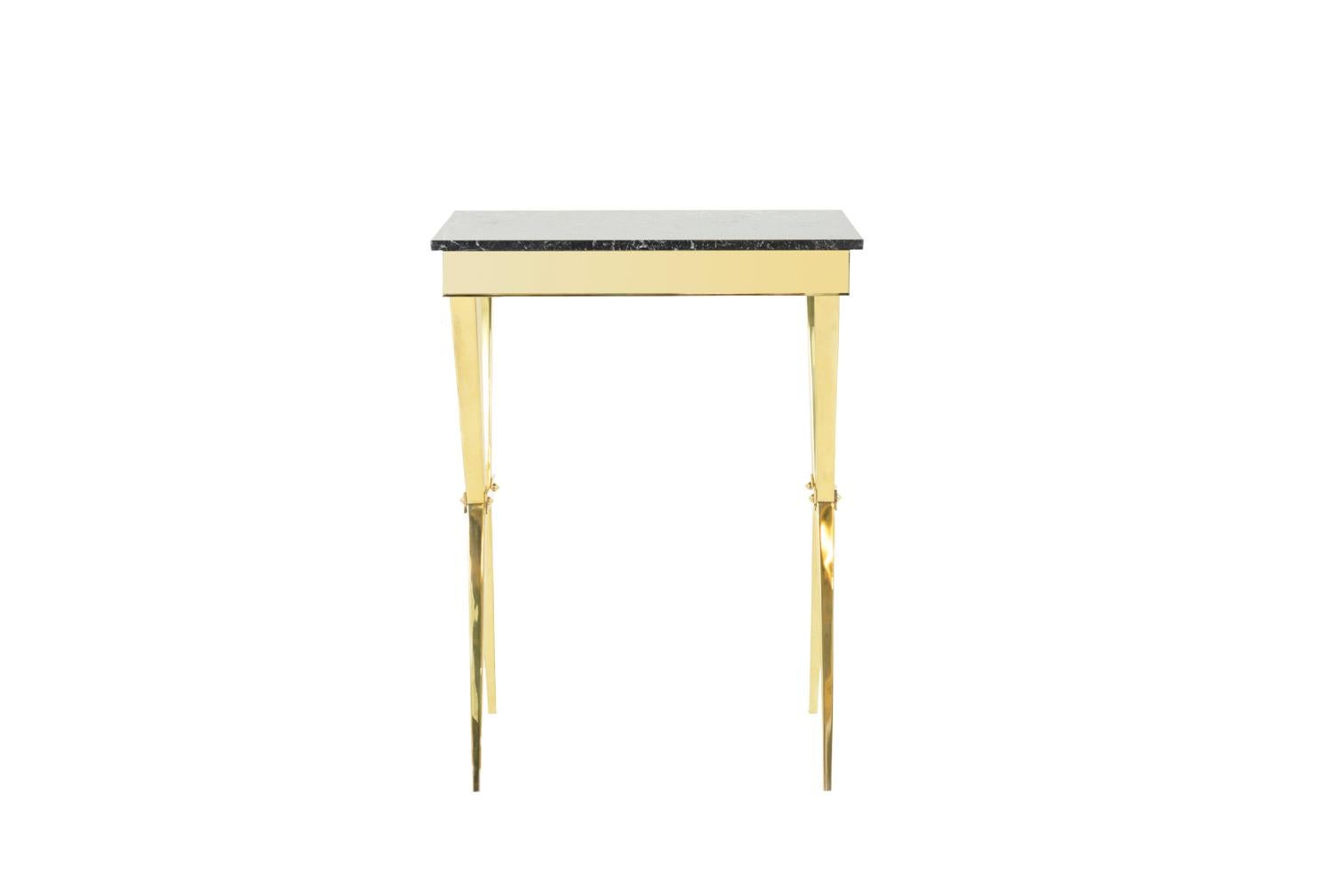 High rectangular console in gilt brass with X legs.
Rectangular black Coquillier d’Izeste marble top.

Work realized in the 1950s.
 