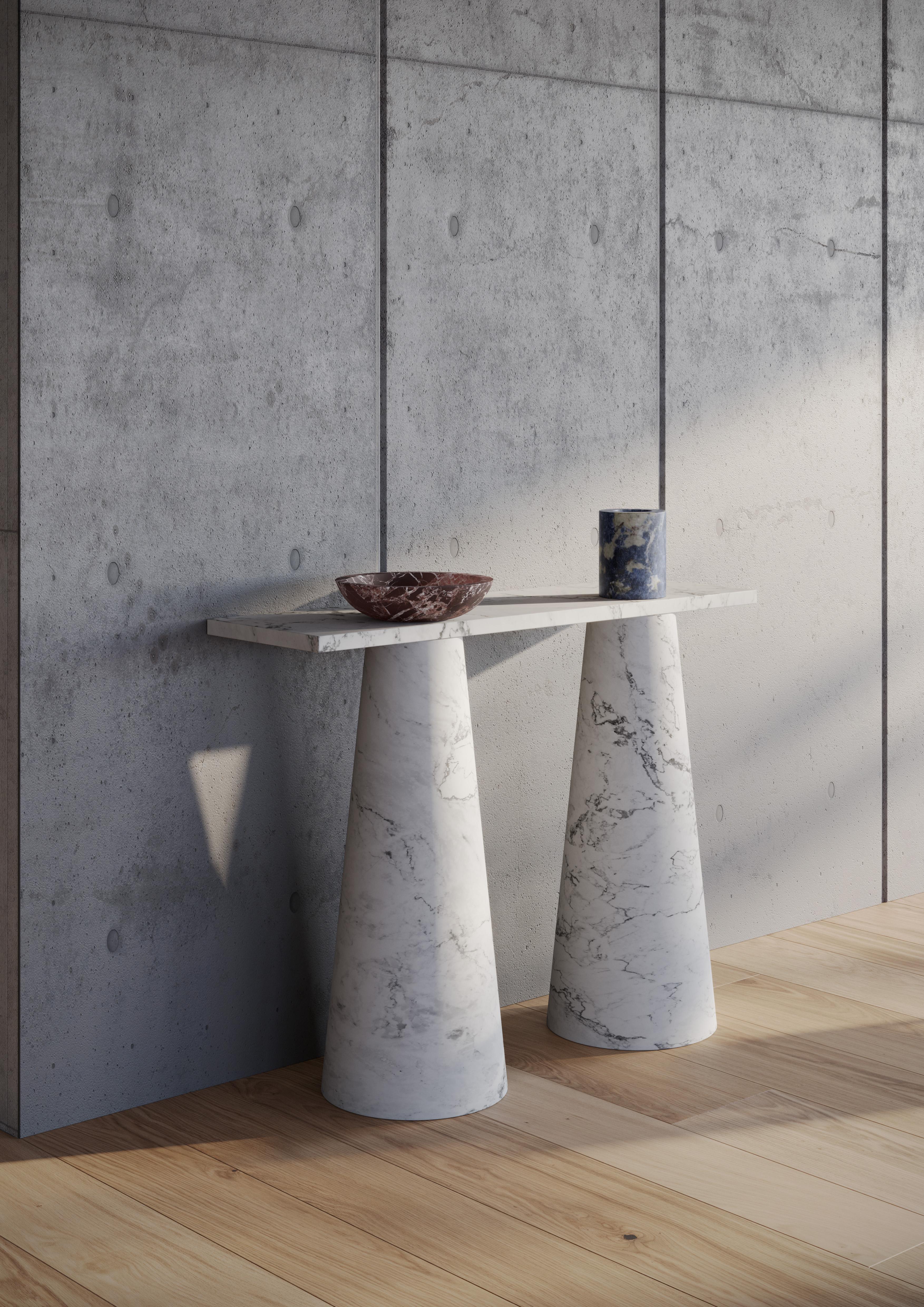 White marble Console designed by Karen Chekerdjian, part of the Inside Out Collection - accessories (fruit bowl, candles, flower vases, tables in red and black marble).

An endlessly astonishing design, Inside Out is available as a table and console