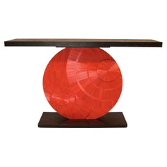 console in red straw and burnt wood marquetry, by les2ebenistes