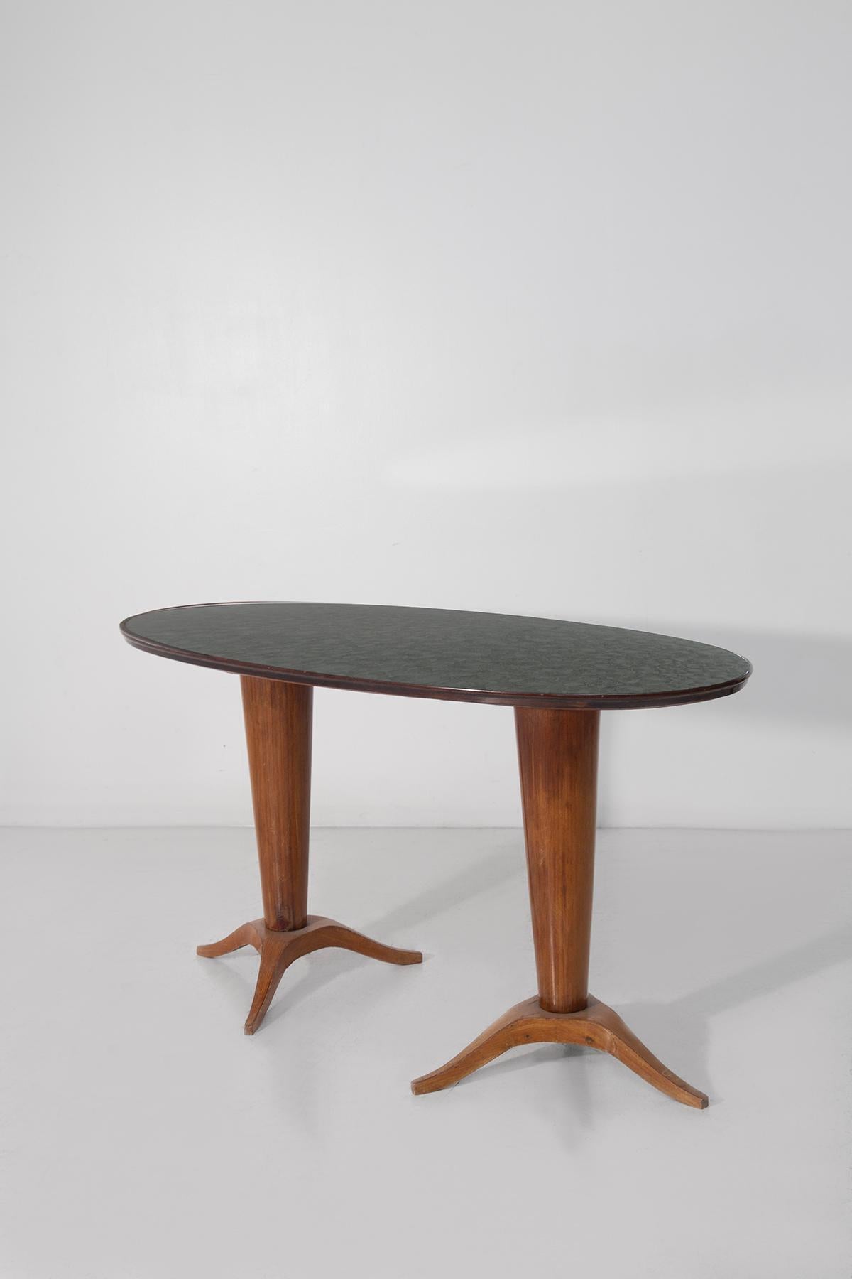 Elegant Italian Console or Small Dining Table – 1950s Mid-Century Modern Design
This refined Italian console table from the 1950s is a beautiful example of mid-century craftsmanship and design elegance. With its compact dimensions, this piece works