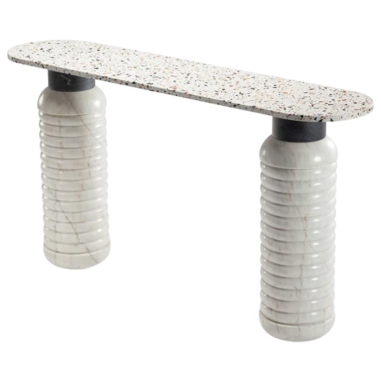 Jean console is unique in its conception. The combination of three different marbles makes it a sign of unconformity and originality. The combination in the picture is in Terrazzo top, Nero Marquina middle part and Estremoz White marble