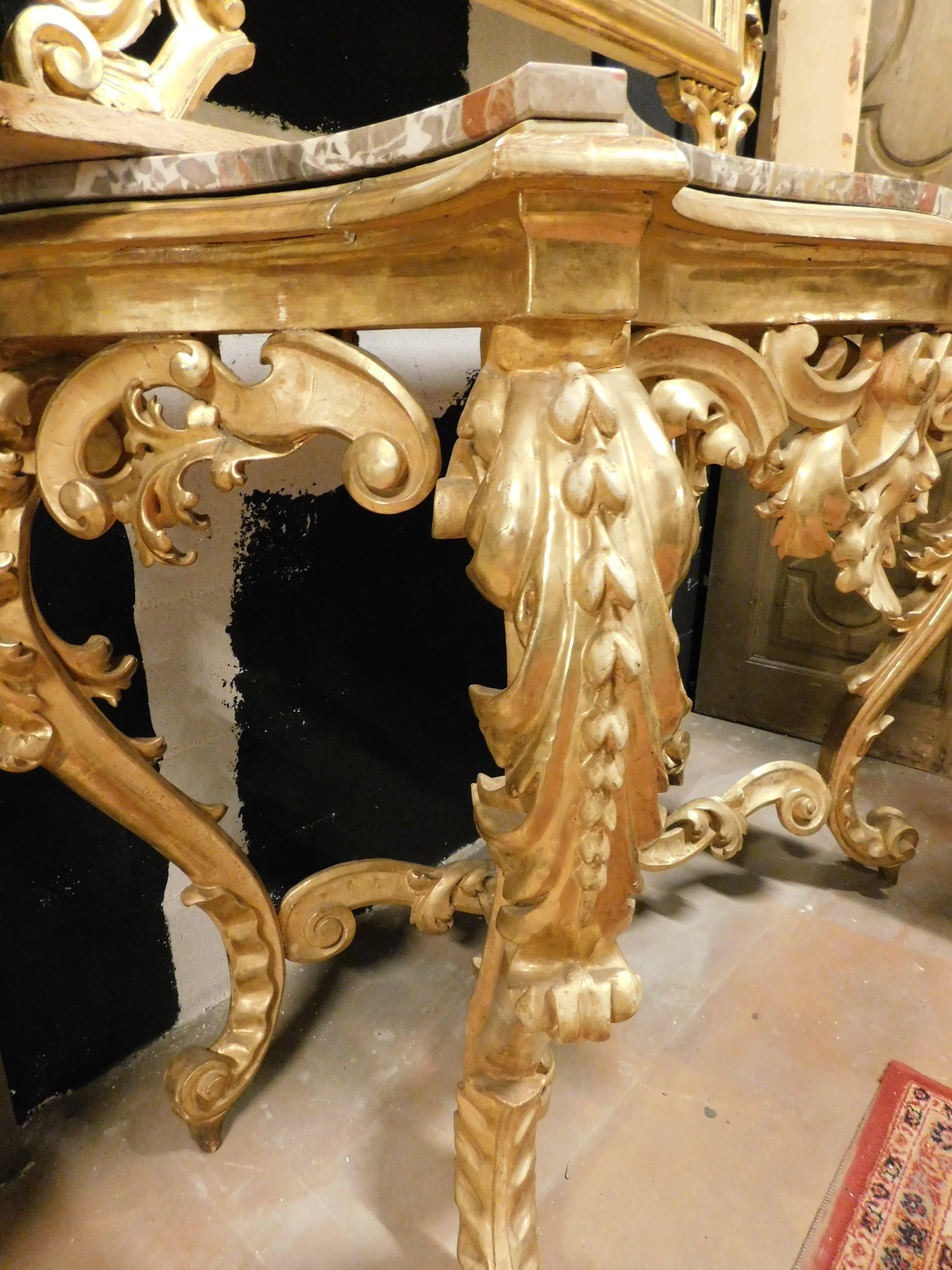 Wood Console mirror in gilded wood carved floral decorations, red marble top, Naples For Sale