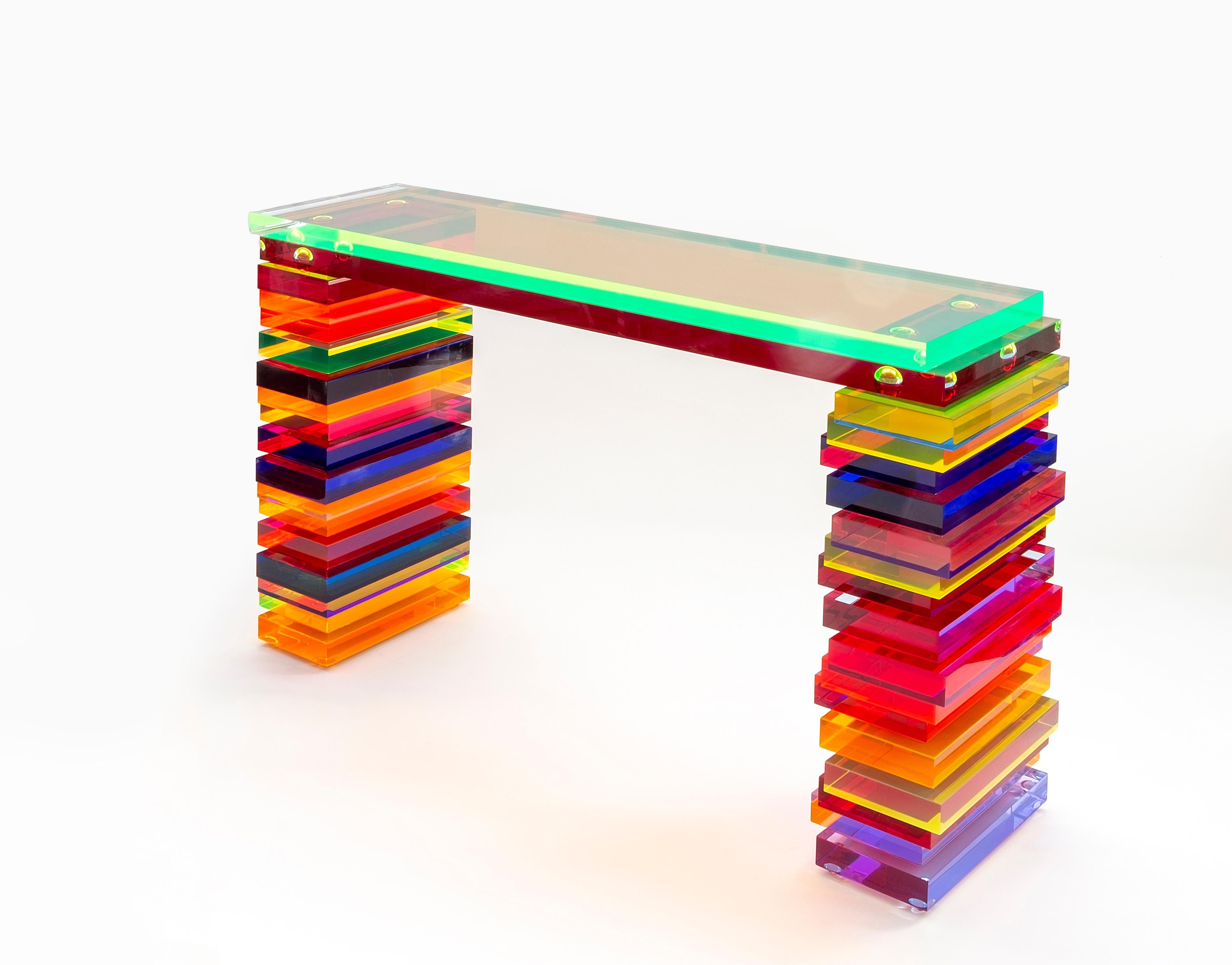 Console Model Disallineata in multi-color plexiglass with an overlap of misaligned rectangular elements
A series of unique pieces designed and produced by Studio Superego.

Biography
Superego editions was born in 2006, performing a constant