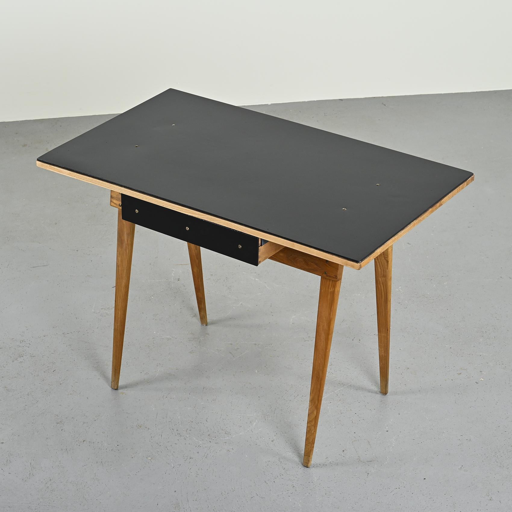 Rare high desk or console  by André Sornay, cabinetmaker, painter and designer from Lyon.

Composed of two inverted U-shaped legs on which a black lacquered top rests and accommodates a central storage drawer. A fine example of 