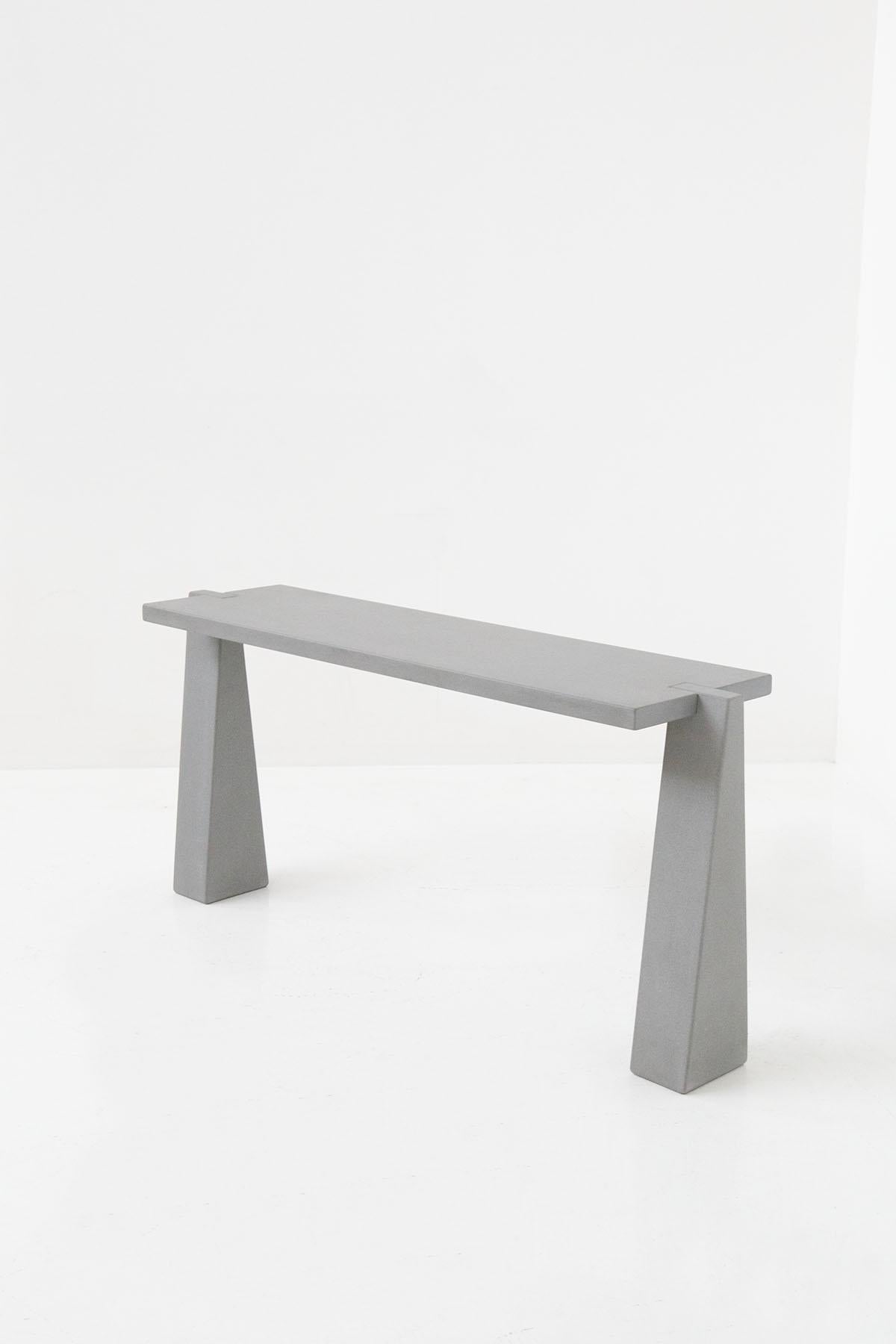 Italian Pietra Serena console table design Angelo Mangiarotti. The console table is made entirely of stone and is made with clean, essential lines and form typical of Mangiarotti's design. This console table resembling monoliths is a great example