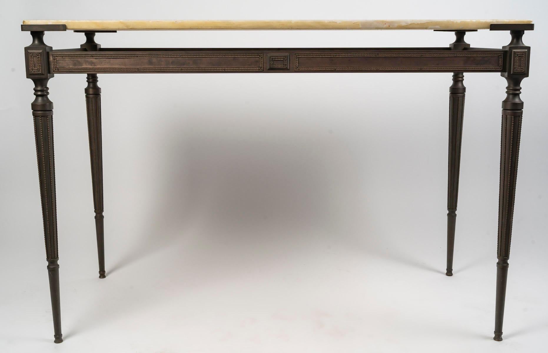 Console, side table, in patinated bronze and marble top, 1950-1960.

Side table, console, from the 1950s-1960s, patinated bronze console and marble top, sculptural bronze base, lacking varnish.
H: 79cm, W: 115cm, D: 54cm