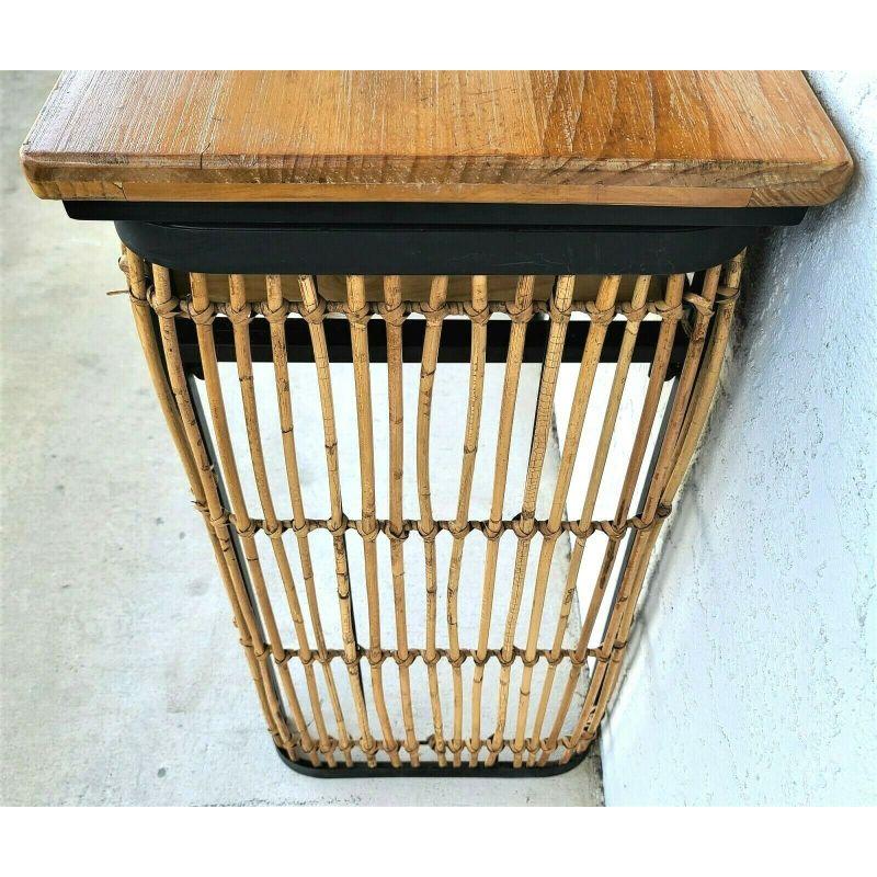 For FULL item description click on CONTINUE READING at the bottom of this page.

Offering One Of Our Recent Palm Beach Estate Fine Furniture Acquisitions Of A 
Boho bamboo rattan wood and metal 2 drawer console sofa table.

Approximate