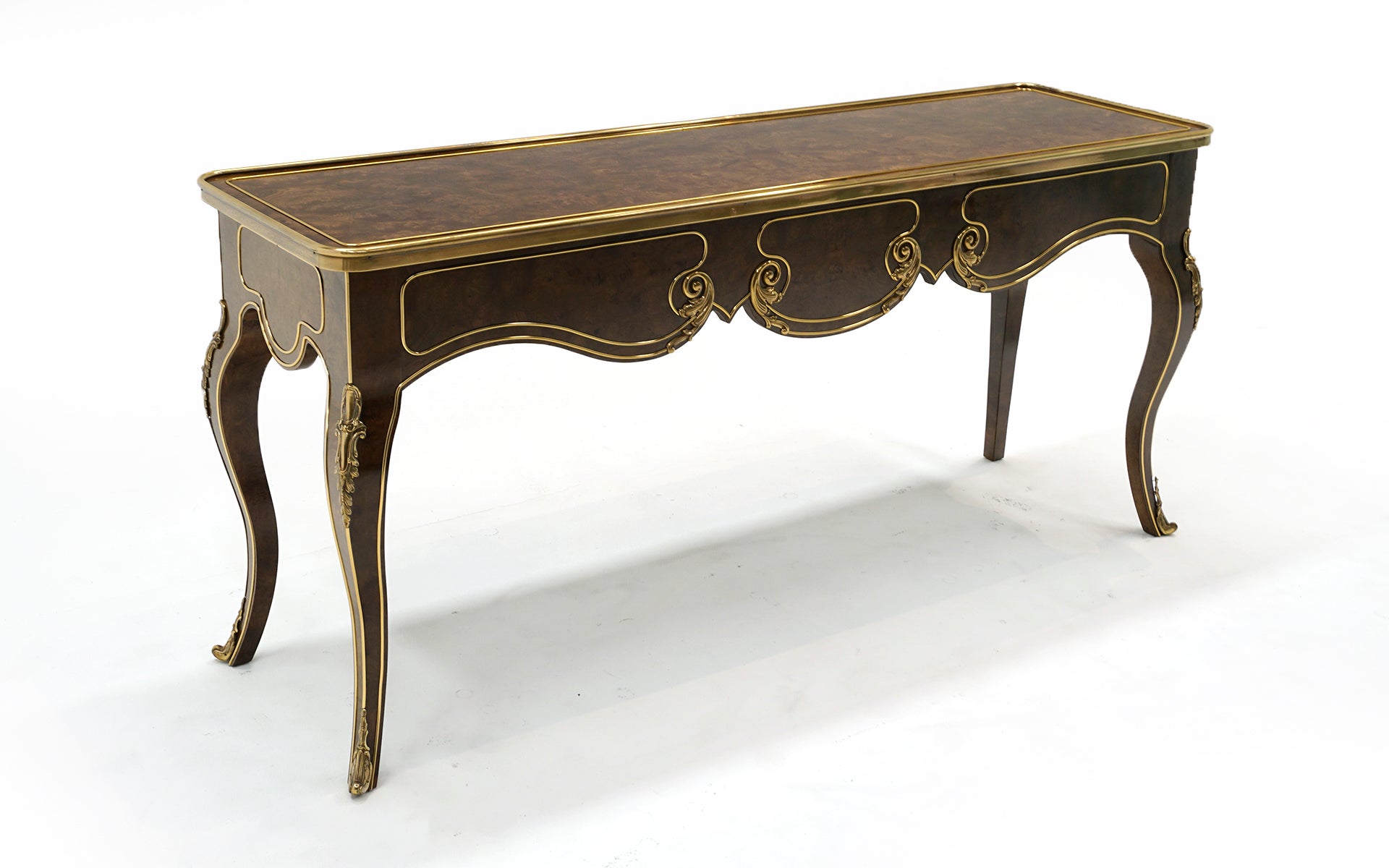 Beautiful Hollywood Regency Style console / sofa / hall table by Mastercraft.  Very good condition with few if any signs of use.  Very striking in person in brass and burl wood.  Original snd ready to use.  Signed on the underside.