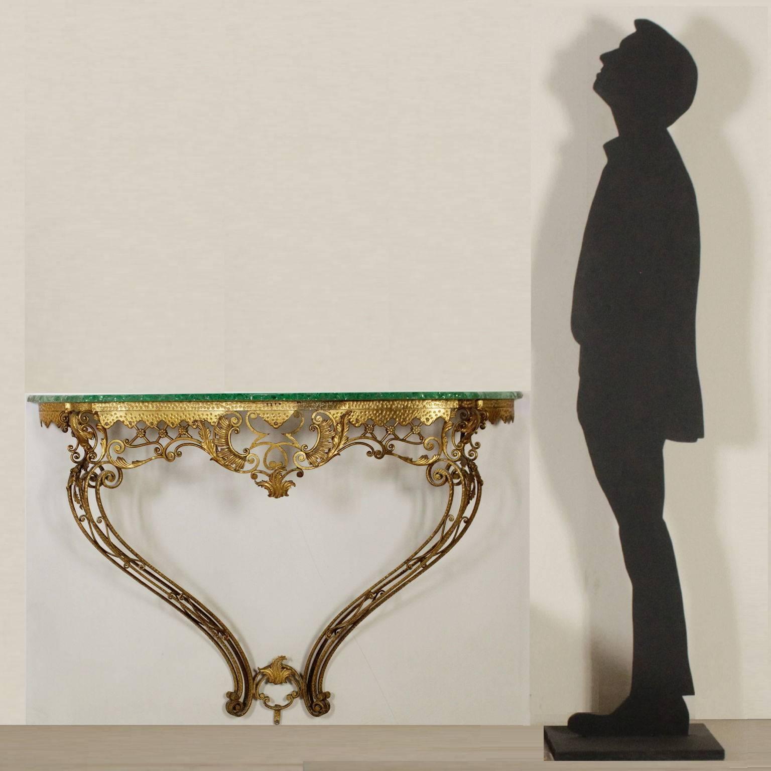 A wall console table, brass-plated iron and crystal. Manufactured in Italy, 1950s.