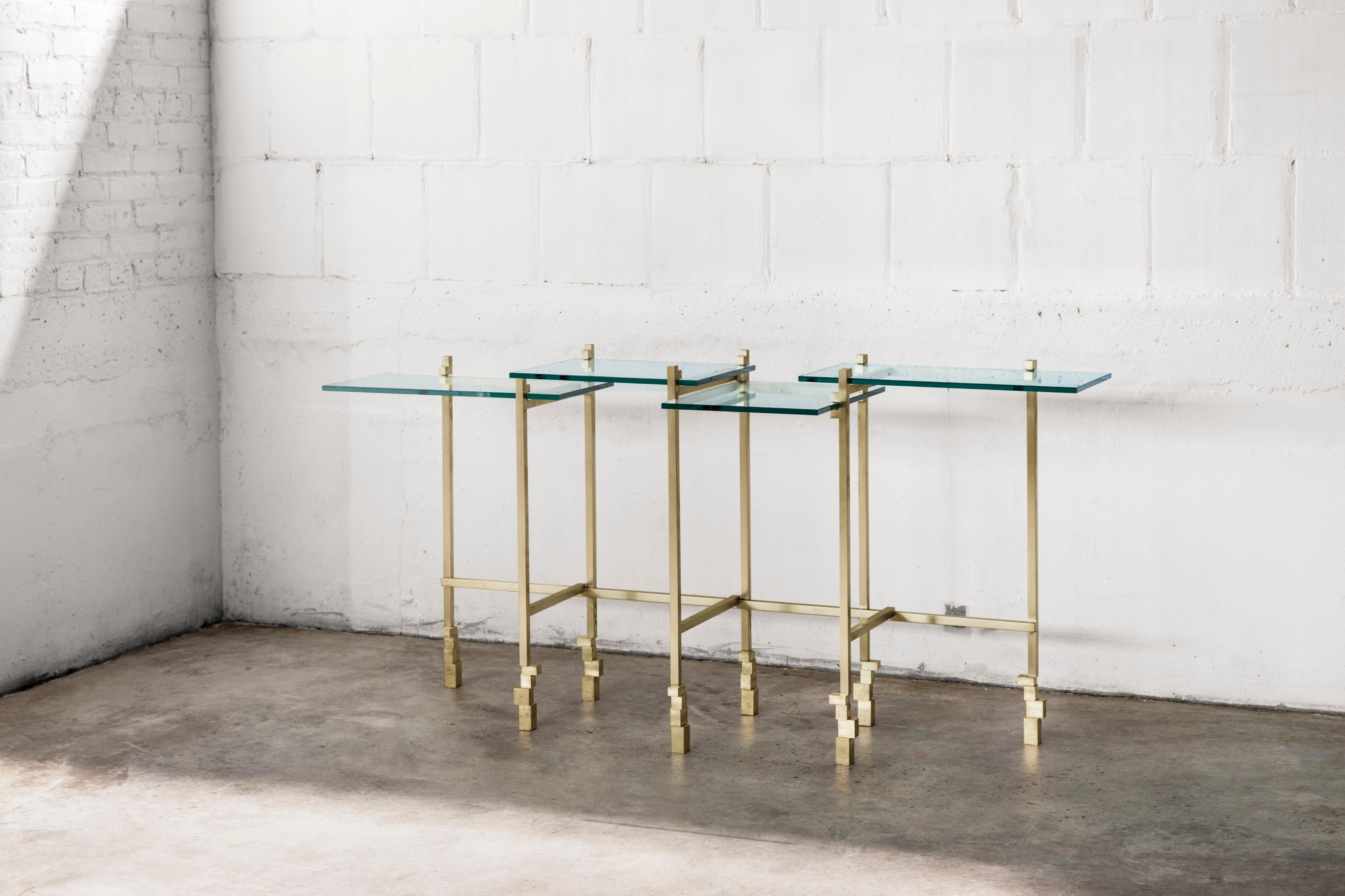 Console table by Gentner Design
Dimensions: D 177.8 x W 37.5 x H 85 cm
Materials: brass, glass

Part of Christopher Gentner's 2018 Fraction Collection, the console table combines multi-leveled glass surface with a brass structure that is