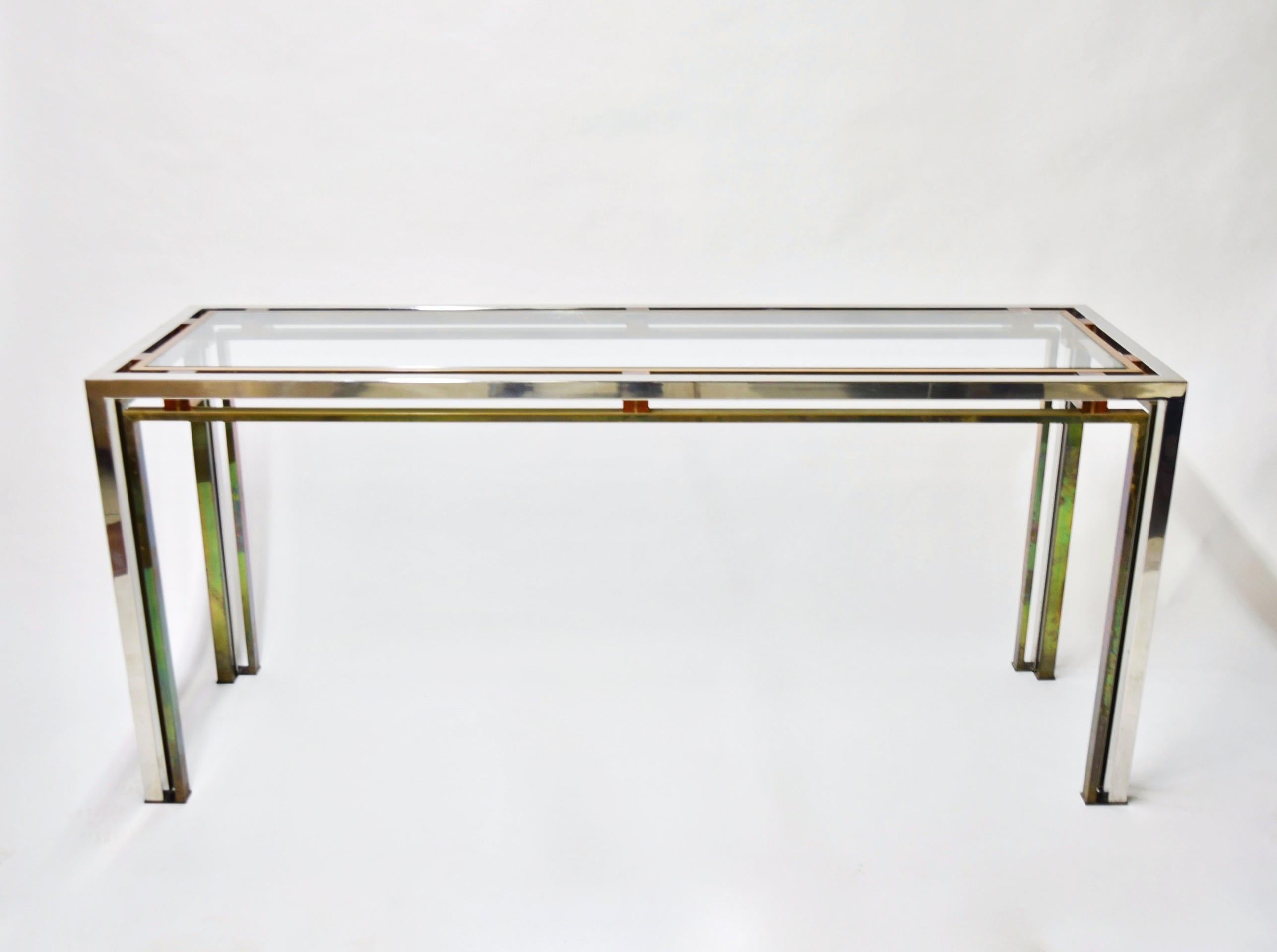 1970s freestanding console table by Romeo Rega in chromed metal, brass with original patina, smoked acrylic details along the top edges and an inset clear glass top.