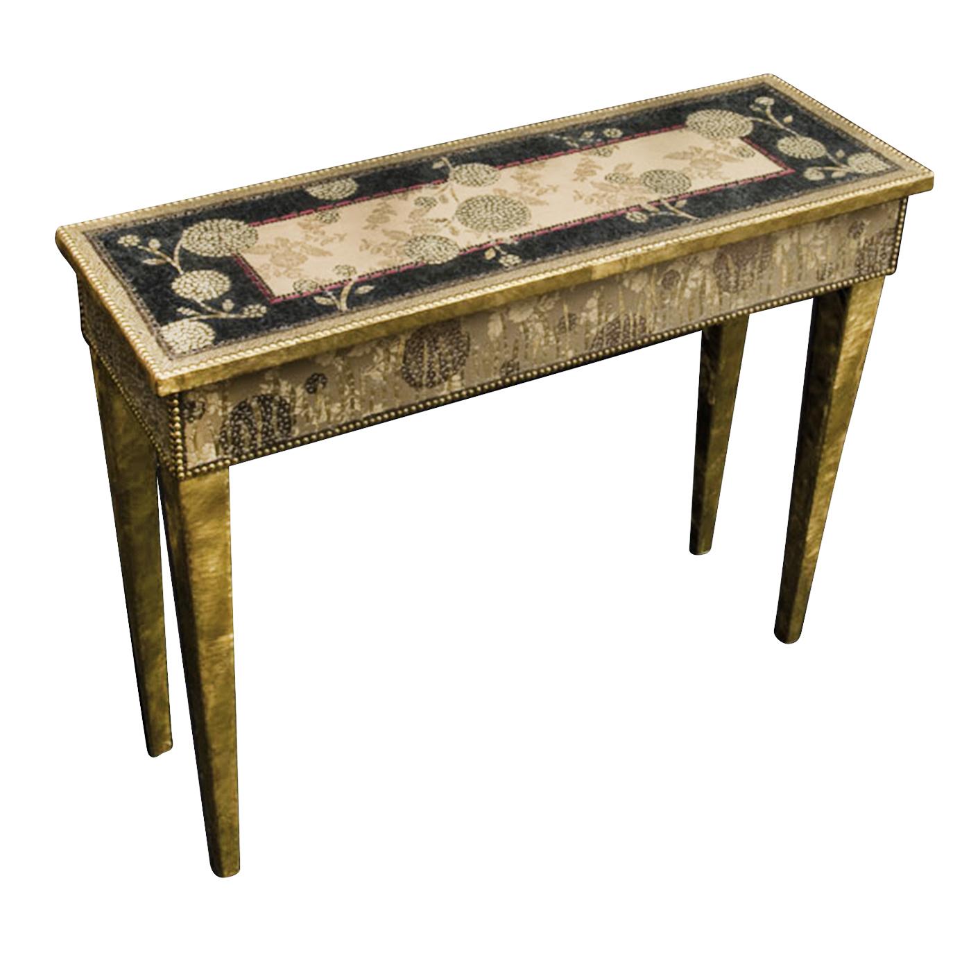 This magnificent console table is made in brass and fiberglass and is hand-decorated with sequins in whimsical patterns that are accented with studs and nails.