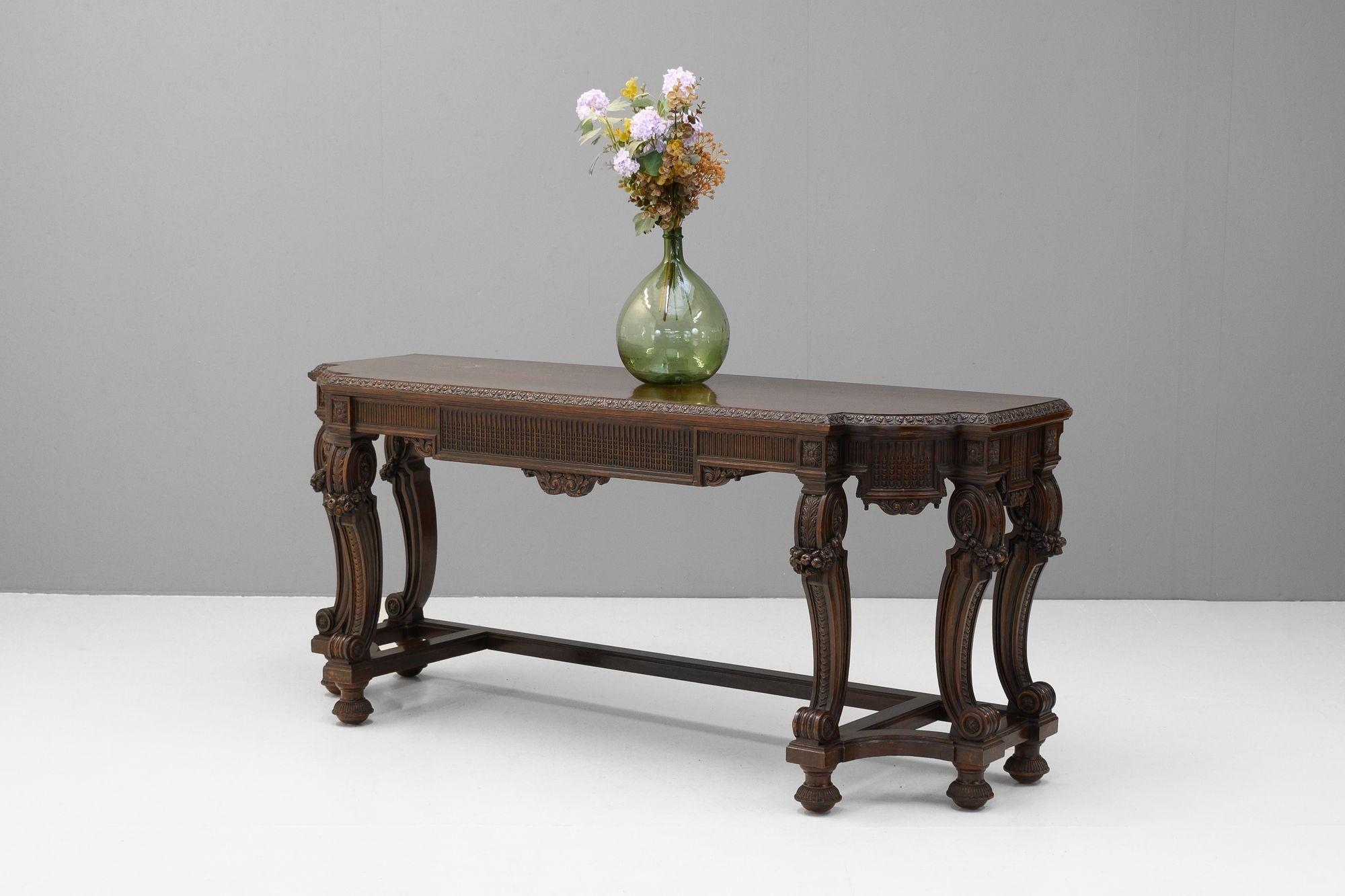 Large walnut console with drawer in frieze on stylised cabriole legs. Circa 1900.
H 81cm (AH 64cm) x W 183cm x D 56cm