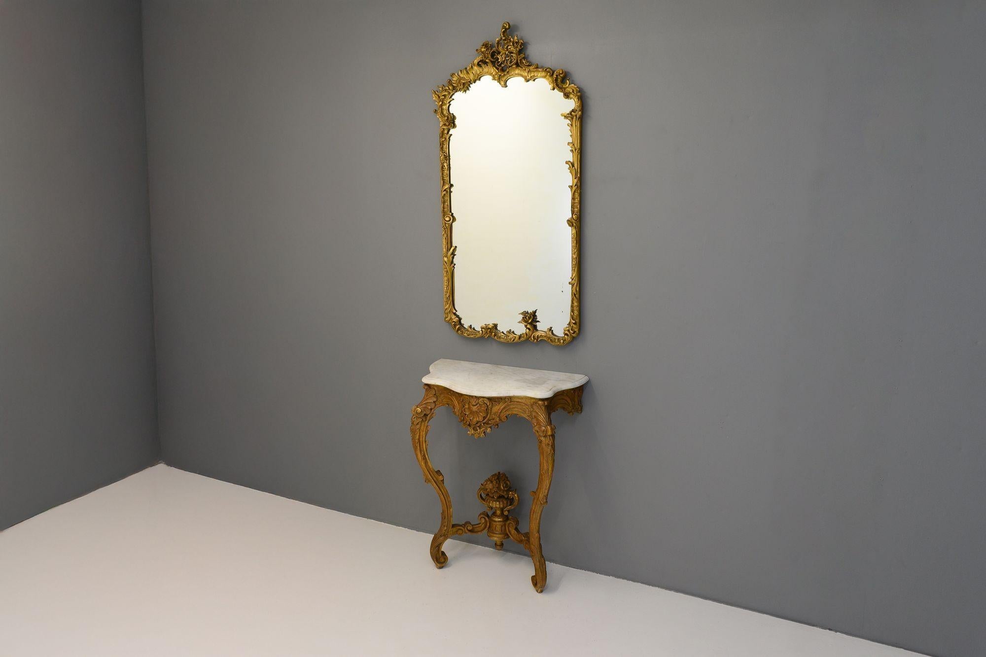 Swedish marble top console table on cabriole legs with vase decoration in original gilded finish. Circa 1890.


H 97cm x W 79cm x D 41cm