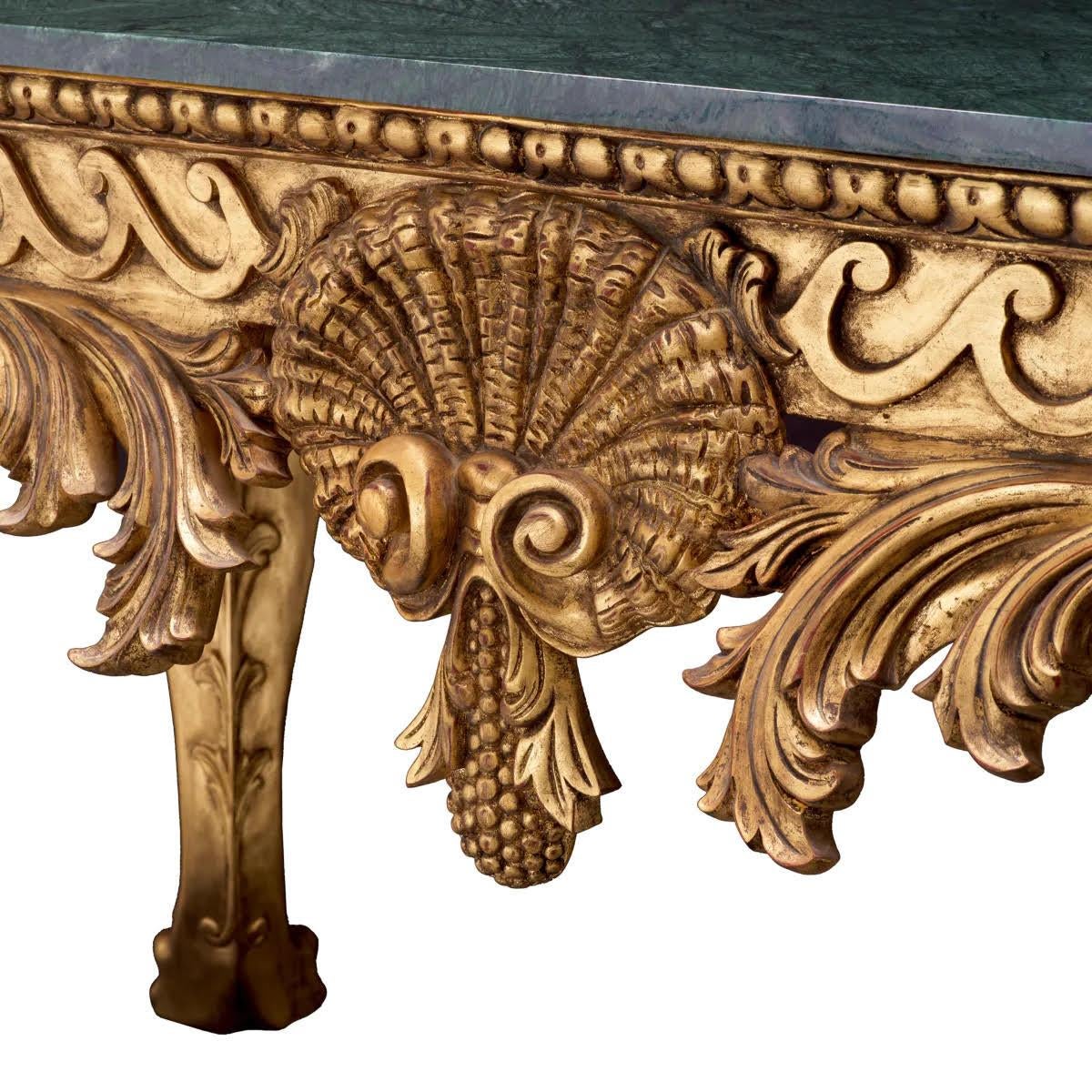 Console table in gilded wood and green marble, contemporary work.

Console table in the 18th century Italian style in gilded wood and green marble, contemporary work. 
W. 180  D. 82  H. 90,5 cm
