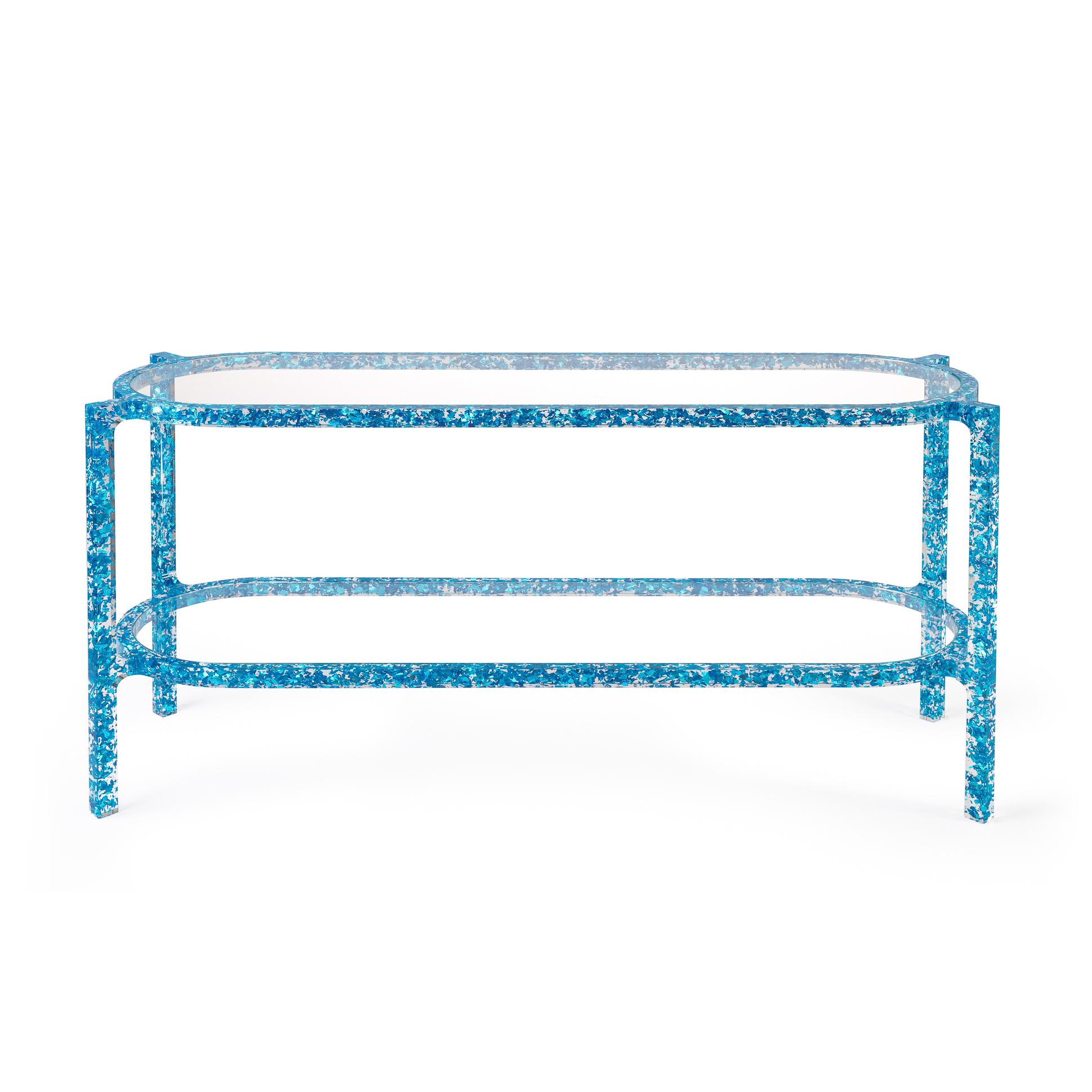 The MIDAS console table is comprised of carefully shredded coloured silver-leaf, all left to randomly float in the table’s crystal clear acrylic frame. Light bounces and reflects off the leaf providing a confetti-like pattern and a unique fragmented