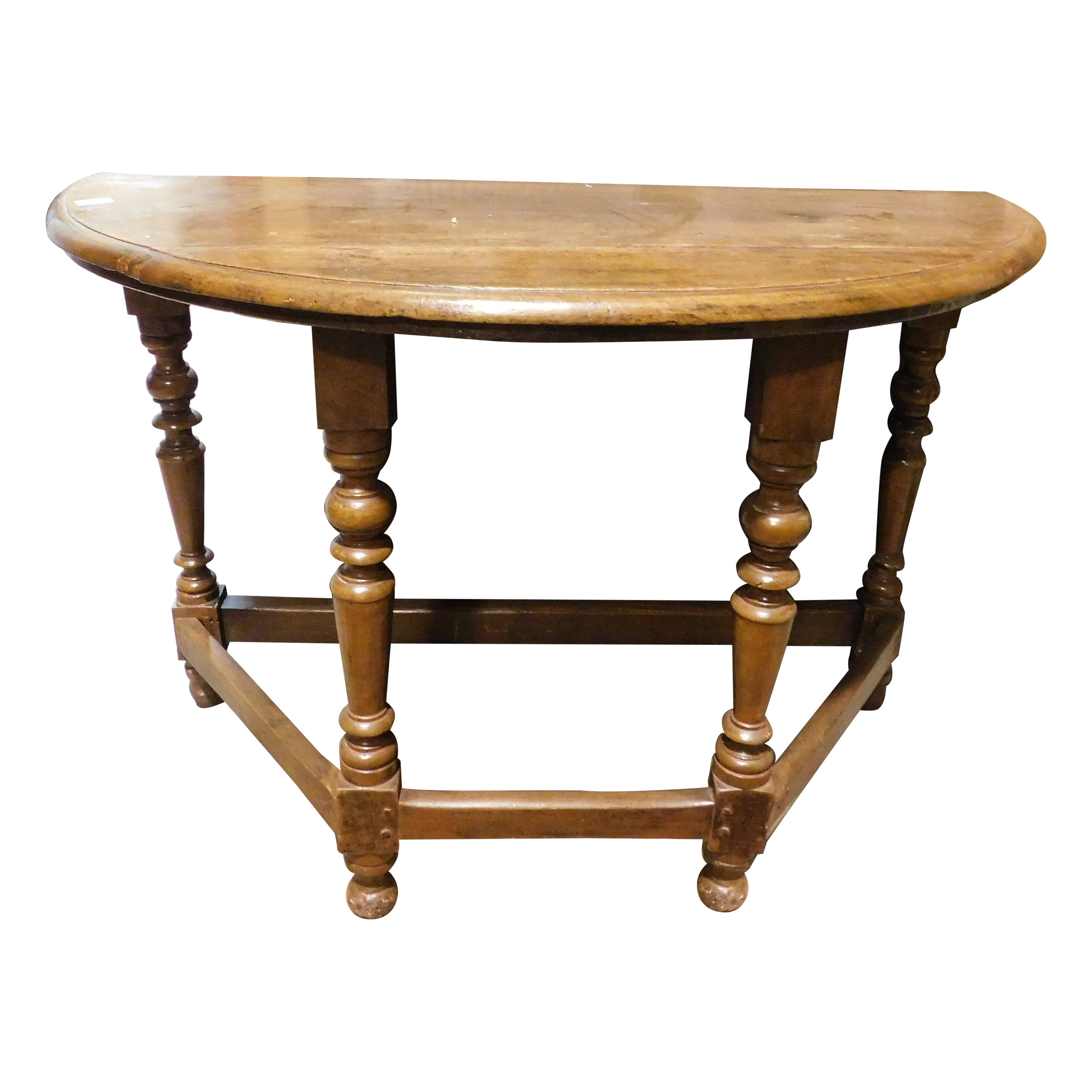 Tavolo consolle in legno di noce, gambe tornite unite da traverse, Italia