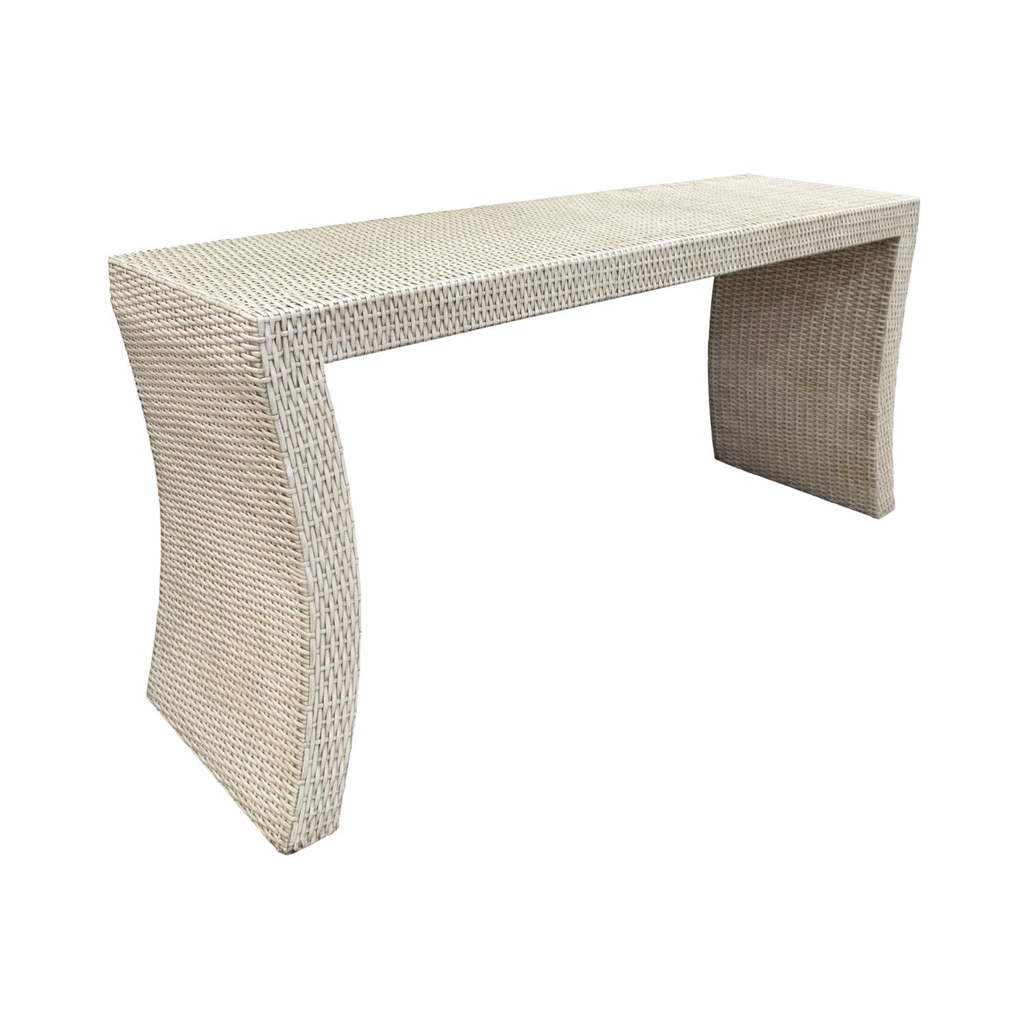 Karl Springer style console table in white wicker with curving sides, American, 1970s. This console is very chic.