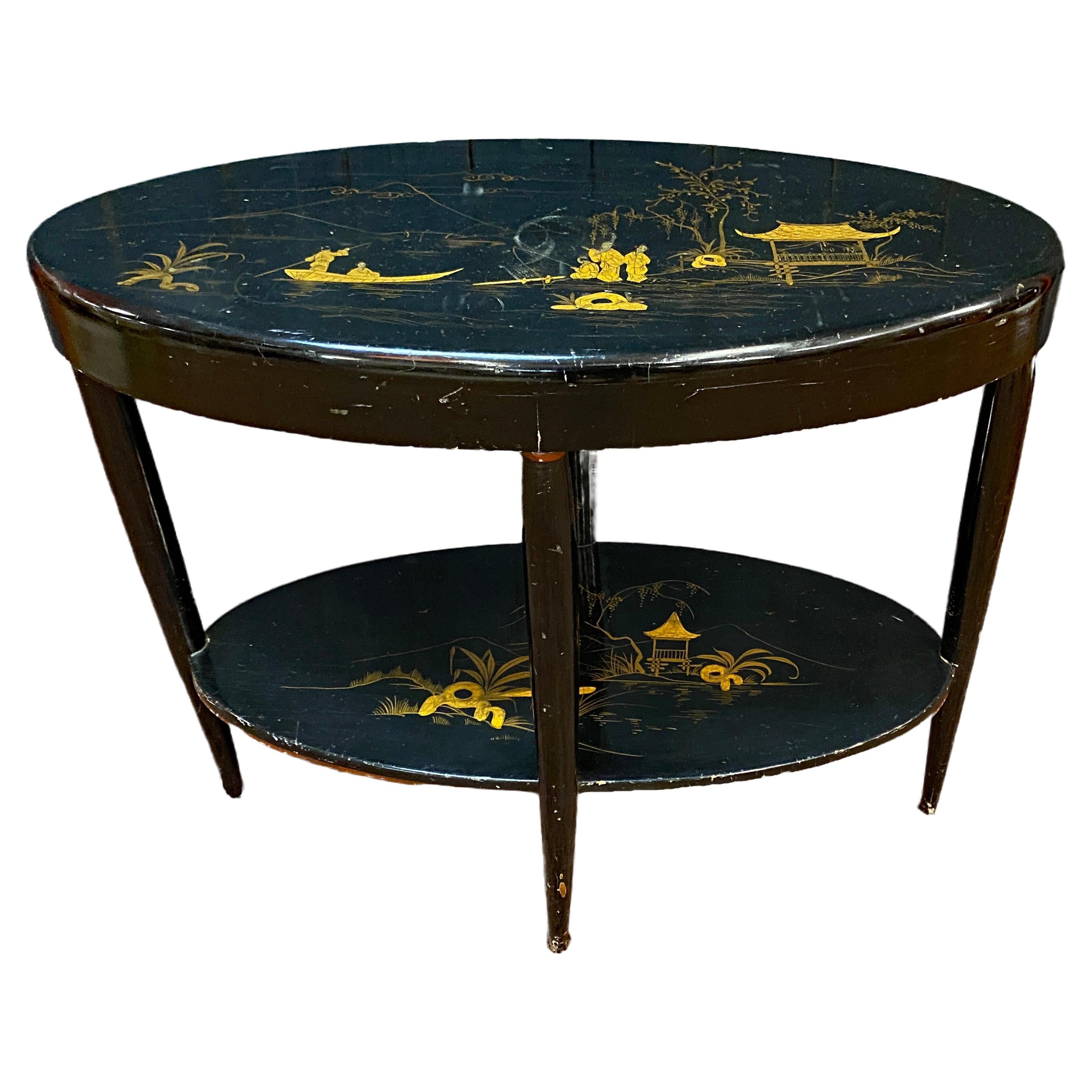 Table console ou Gueridon haut  en bois laqué noir et or circa 1930 en vente