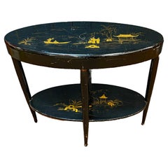 Table console ou Gueridon haut  en bois laqué noir et or circa 1930