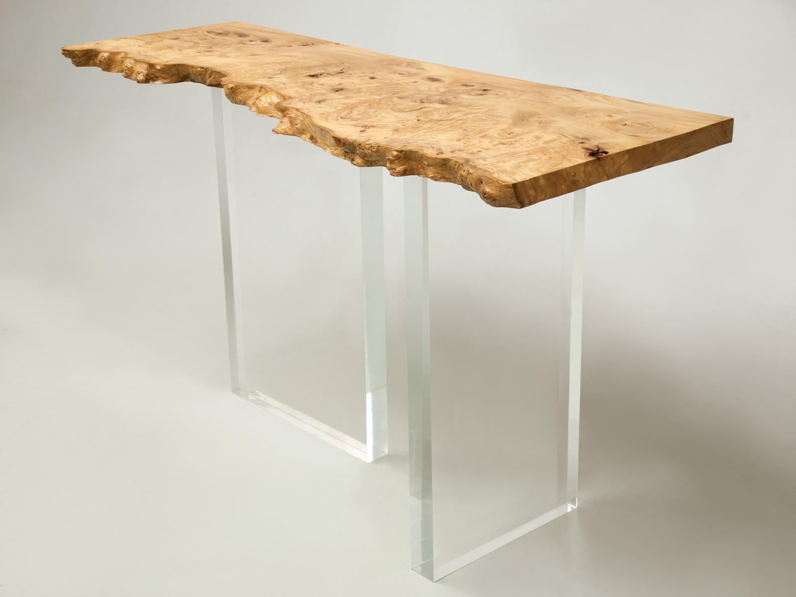 Custom hand-made burl elmwood and acrylic console table made in our Old Plank workshop. Our craftsmen collaborated with one of Chicago's best known design firms to produce this custom acrylic and burl elmwood console table with a contemporary style